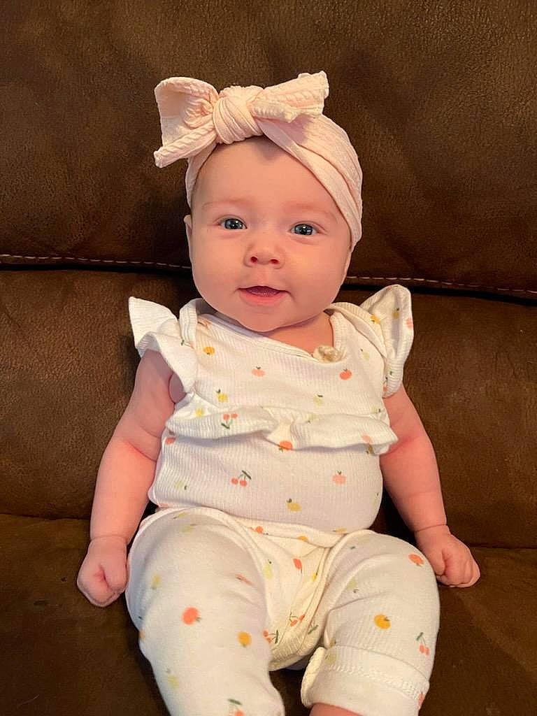 Lyra joined the competition — help win amazing prizes! baby, baby_toddler_clothing, cheek, child, collar, comfort, eye, face, fashion_accessory, happy, head, headband, headpiece, headwear, iris, lip, pattern, person, sitting, sleeve