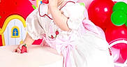 Ailany Hernández joined the competition — help win amazing prizes! balloons, barefoot, birthday, bow, celebration, child, colorful, curly_hair, cute, decor, dress, indoor, party, pink_bow, portrait, props, smiling, strawberry, toddler, white_dress