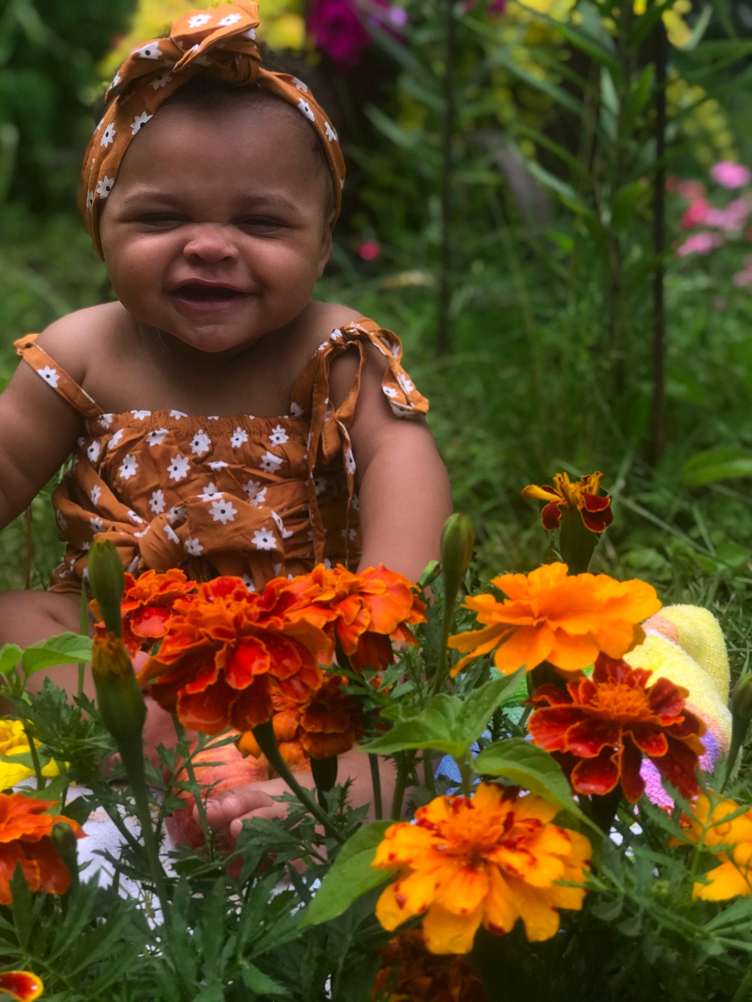 Rosie joined the competition — help win amazing prizes! annual_plant, botany, child, cut_flowers, floral_design, floristry, flower, flowering_plant, lei, person, petal, plant, toddler, wildflower