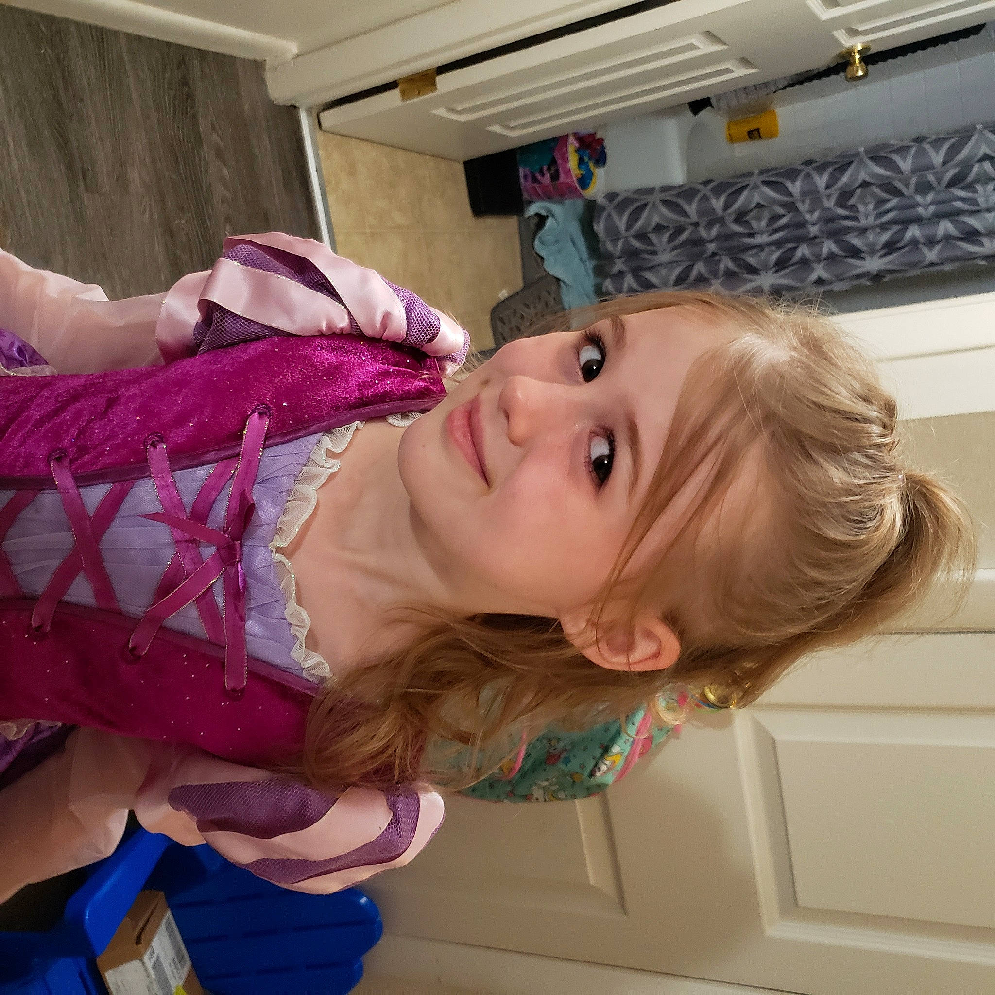 Karissa joined the competition — help win amazing prizes! baby_toddler_clothing, blond, child, comfort, fun, happy, joy, magenta, mouth, person, pink, room, skin, smile, suit, toddler, vacation