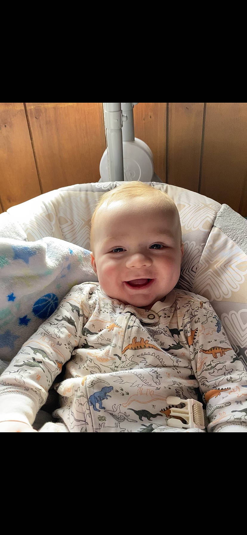 Grayson is registered to the contest to win money with this photo: arm, baby, baby_toddler_clothing, cheek, child, chin, comfort, eye, face, hair, happy, head, military_camouflage, mouth, nose, person, skin, sleeve, smile, toddler