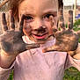 Lana is registered to the contest to win money with this photo: child, dirt, dirty_hands, smiling, outdoor, face, hands, long_hair, pink_shirt, grass, fence, playful, messy, portrait, cute, nature, happy, closeup, young, fun
