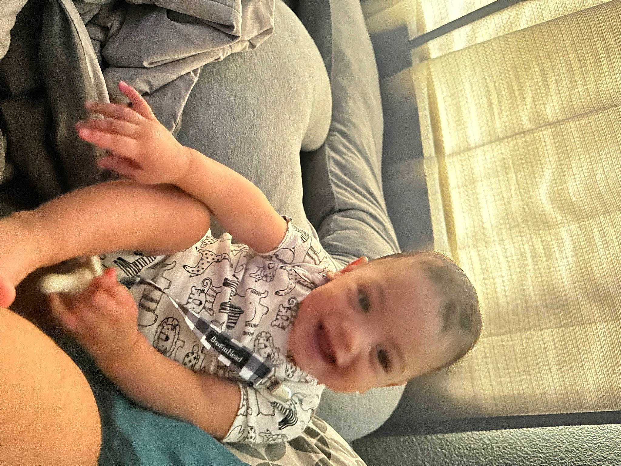 Seth is registered to the contest to win money with this photo: abdomen, arm, baby, chest, child, comfort, elbow, gesture, human_body, human_leg, joint, joy, knee, leg, nail, person, sitting, thigh, toddler, trunk