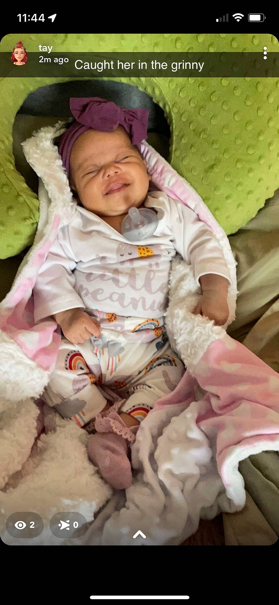 Sol Grace is registered to the contest to win money with this photo: baby, baby_toddler_clothing, bedding, cheek, child, comfort, face, fun, happy, linens, magenta, peach, person, pink, room, sitting, skin, sleeve, smile, textile