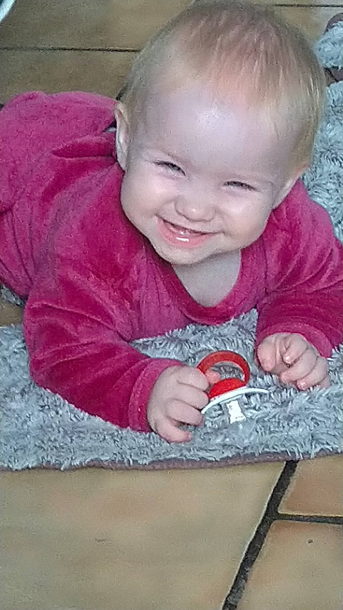 Maëlyne participe au concours pour gagner de l'argent avec cette photo : boy, cheek, child, day, eye, face, forehead, girl, head, human_hair_color, infant, joy, mouth, nose, person, pink, play, product, skin, smile