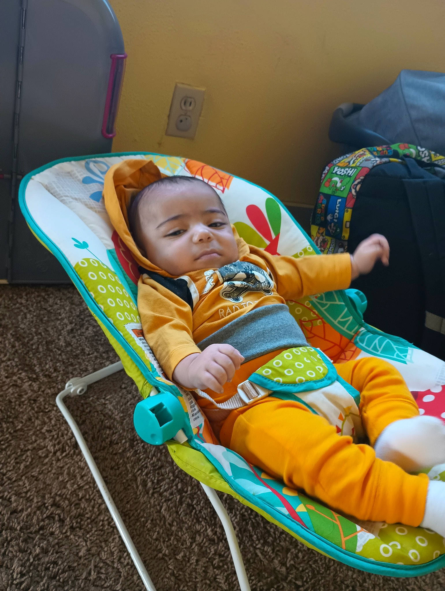 Atreus joined the competition — help win amazing prizes! baby, baby_carriage, baby_products, baby_safety, baby_toddler_clothing, car_seat, chair, child, comfort, event, lap, leisure, person, room, sitting, toddler, yellow