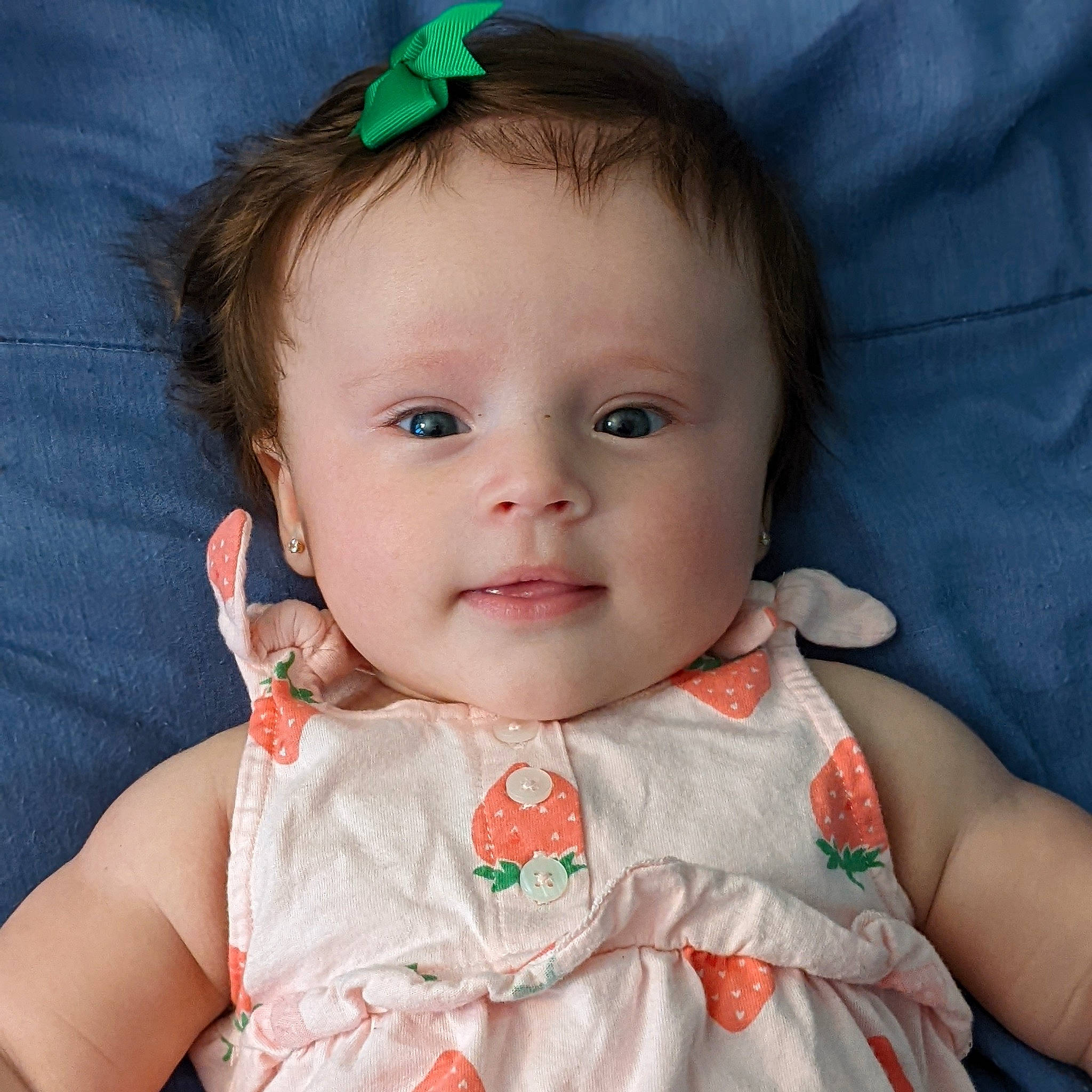 Carmela is registered to the contest to win money with this photo: baby_toddler_clothing, blue, cheek, chin, clothing, dress, eye, eyebrow, face, green, hair, hairstyle, head, human_body, lip, nose, organ, person, product, skin