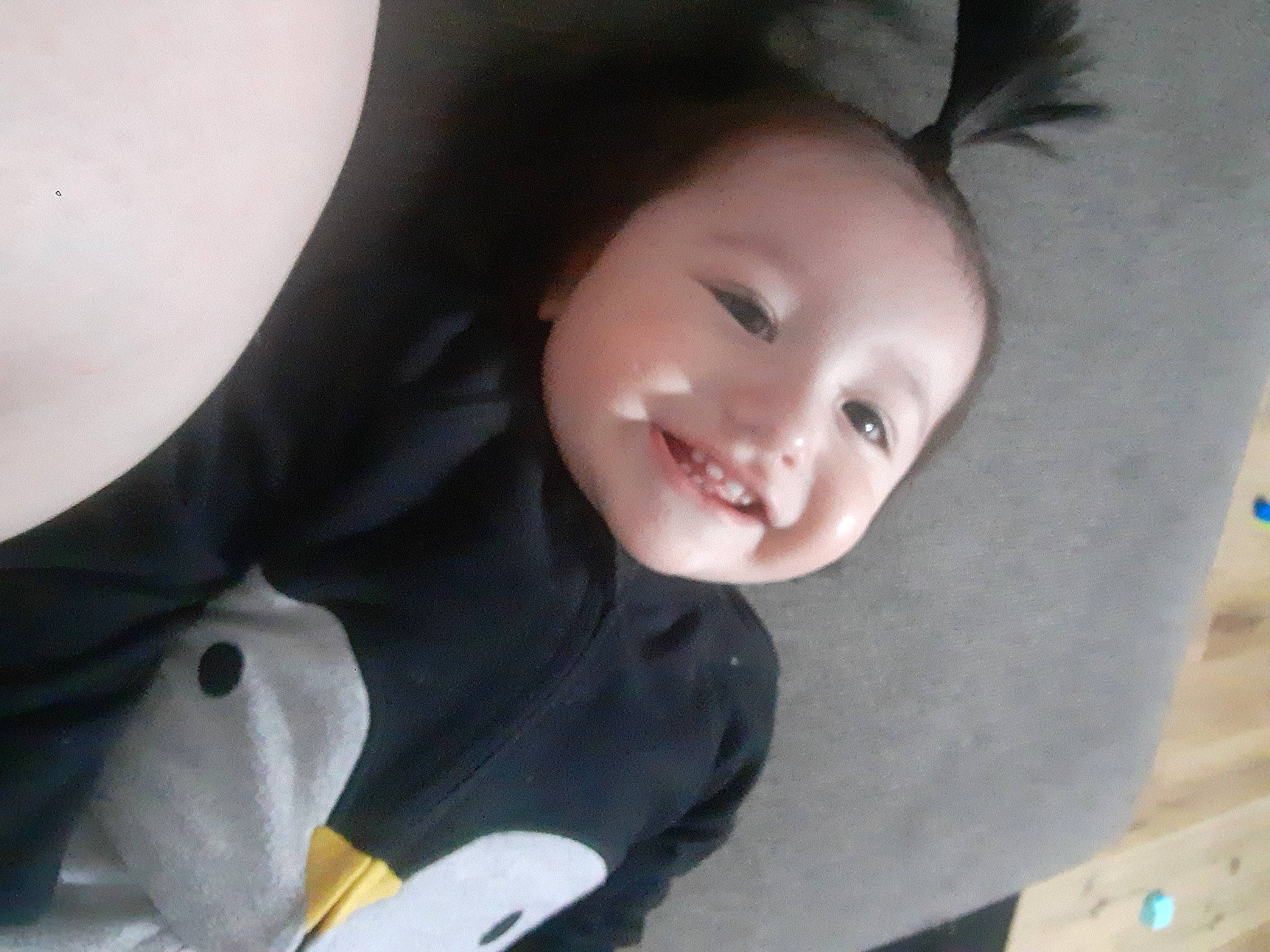 Mateo is registered to the contest to win money with this photo: baby, baby_toddler_clothing, cheek, child, comfort, eye, eyebrow, formal_wear, happy, iris, joy, mouth, nose, outerwear, person, sitting, skin, sleeve, smile, toddler