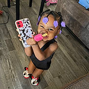 Delee Stewart joined the competition — help win amazing prizes! child, clothing, couch, cream, dessert, electronics, face, female, food, footwear, furniture, girl, head, icecream, mobilephone, person, photography, portrait, shoe, sitting