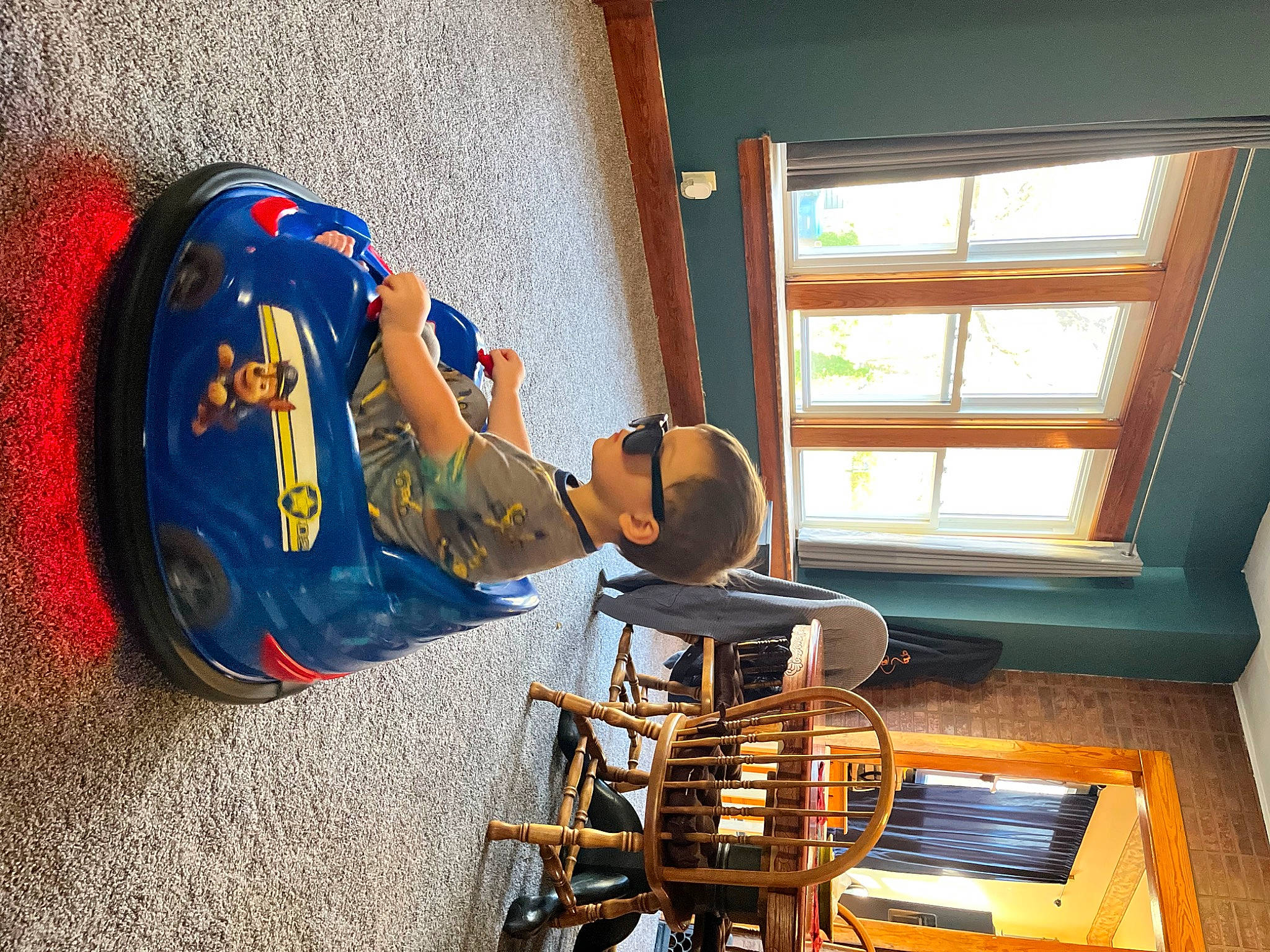 Deven is registered to the contest to win money with this photo: asphalt, automotive_tire, automotive_wheel_system, engineering, floor, flooring, hardwood, helmet, house, machine, musical_instrument, office_equipment, person, personal_protective_equipment, plant, room, tire, wheel, window, wood