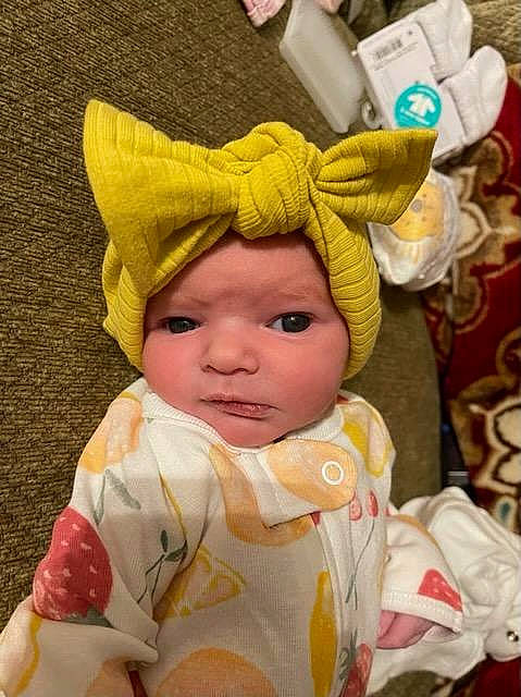 Chloe is registered to the contest to win money with this photo: baby, baby_products, baby_toddler_clothing, cap, cheek, child, chin, costume, costume_hat, event, eye, fashion_accessory, fun, fur, happy, head, headwear, knit_cap, person, sleeve