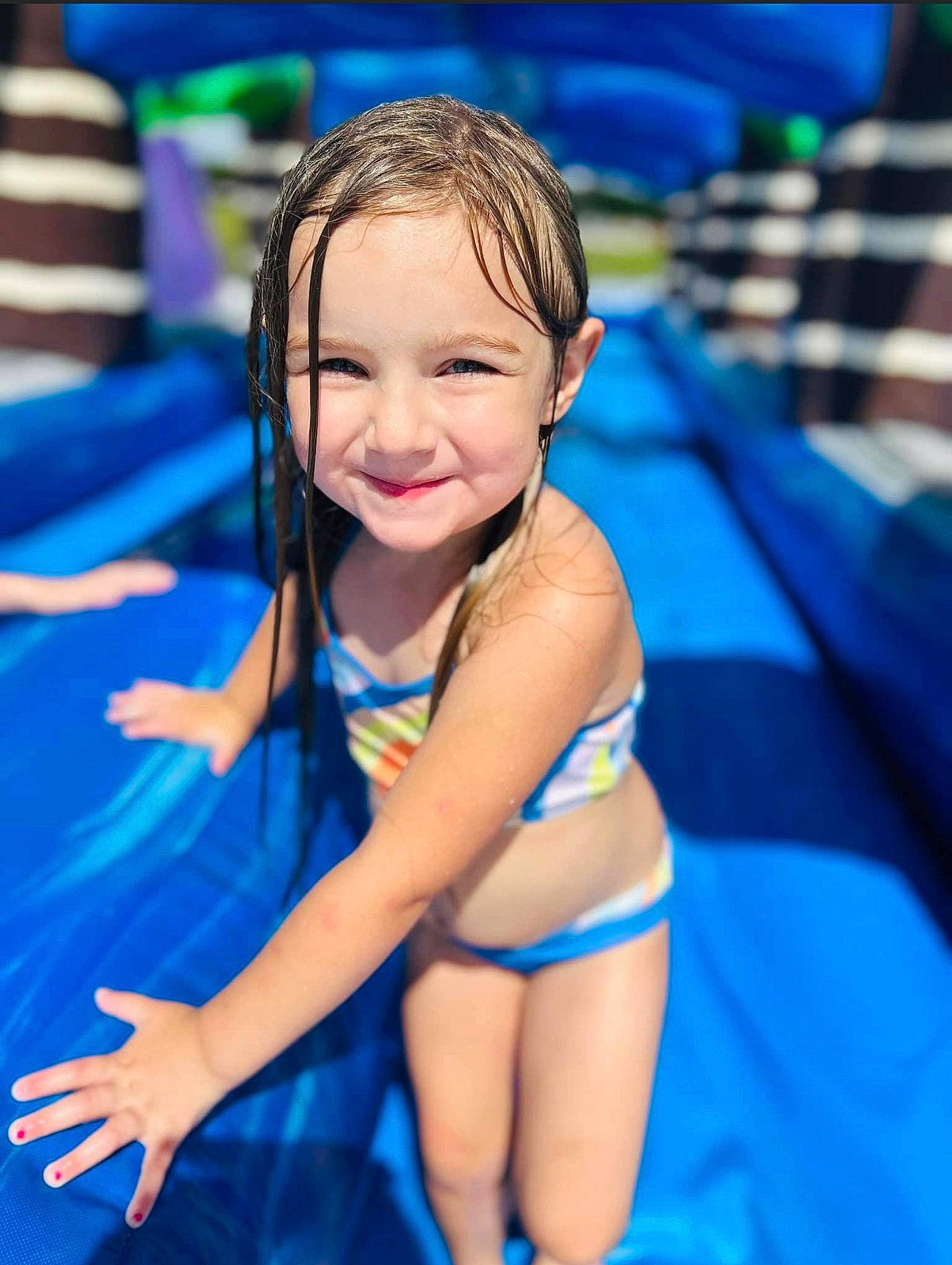 Mckenzie joined the competition — help win amazing prizes! abdomen, blue, chest, child, electric_blue, event, fun, happy, joy, leisure, person, play, recreation, sitting, skin, smile, swimwear, thigh, toddler, undergarment