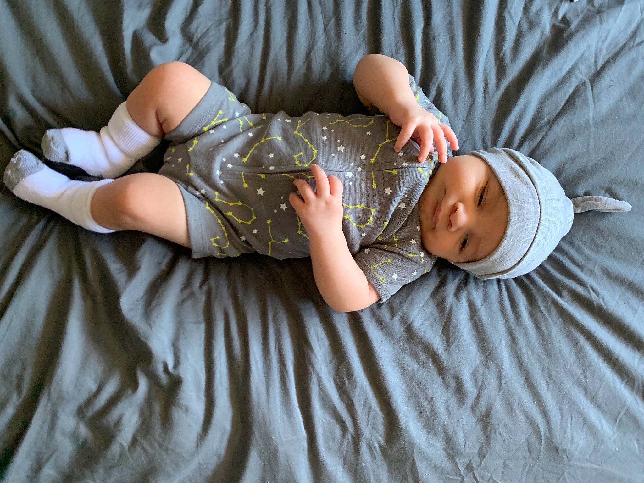 Alexander is registered to the contest to win money with this photo: baby, baby_toddler_clothing, comfort, elbow, eye, finger, flash_photography, glasses, grass, headgear, headwear, human_body, human_leg, knee, leg, person, skin, thigh, toddler, tree