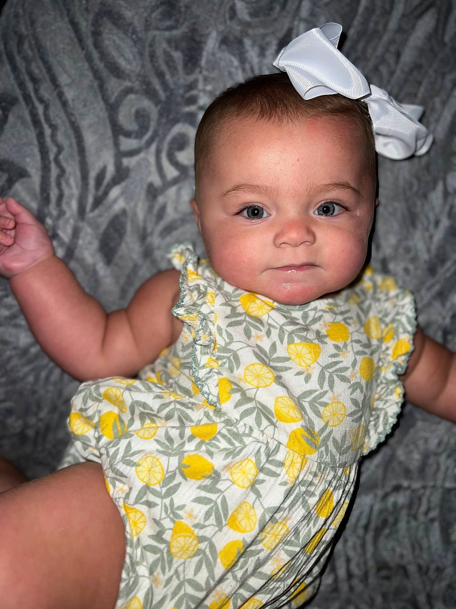 Paislee Sue is registered to the contest to win money with this photo: baby, baby_toddler_clothing, cheek, chest, child, dress, eye, facial_expression, flash_photography, fun, happy, human_body, iris, lip, mouth, nose, person, sitting, skin, toddler