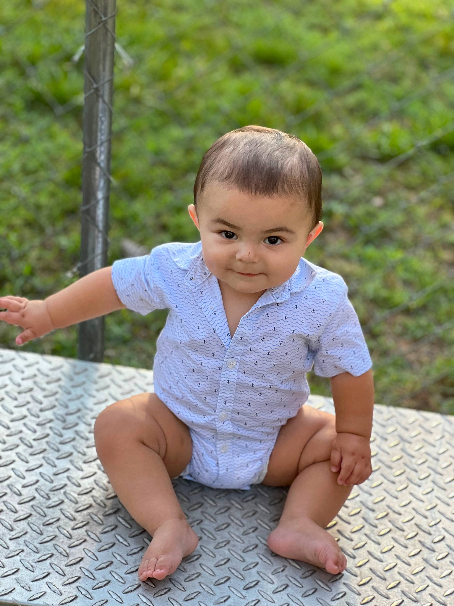 Liam Lewis joined the competition — help win amazing prizes! baby, baby_toddler_clothing, barefoot, child, dress, finger, flooring, foot, fun, grass, happy, joy, leisure, people_in_nature, person, recreation, sitting, sleeve, smile, toddler