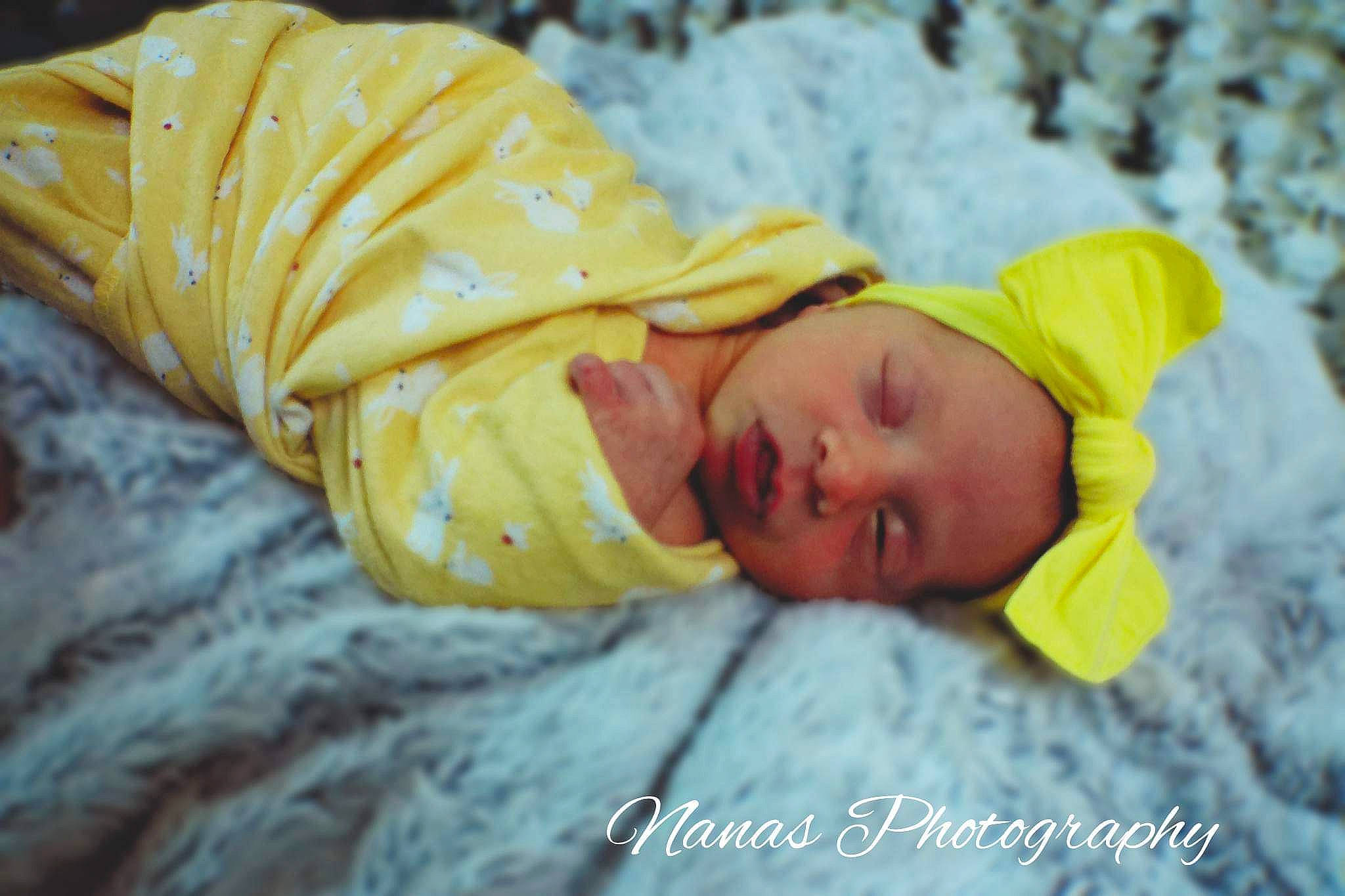 Amelia joined the competition — help win amazing prizes! baby, baby_products, baby_sleeping, baby_toddler_clothing, beanie, bedding, bedtime, blanket, child, comfort, fun, fur, grass, knit_cap, linens, nap, person, sleep, textile, toddler