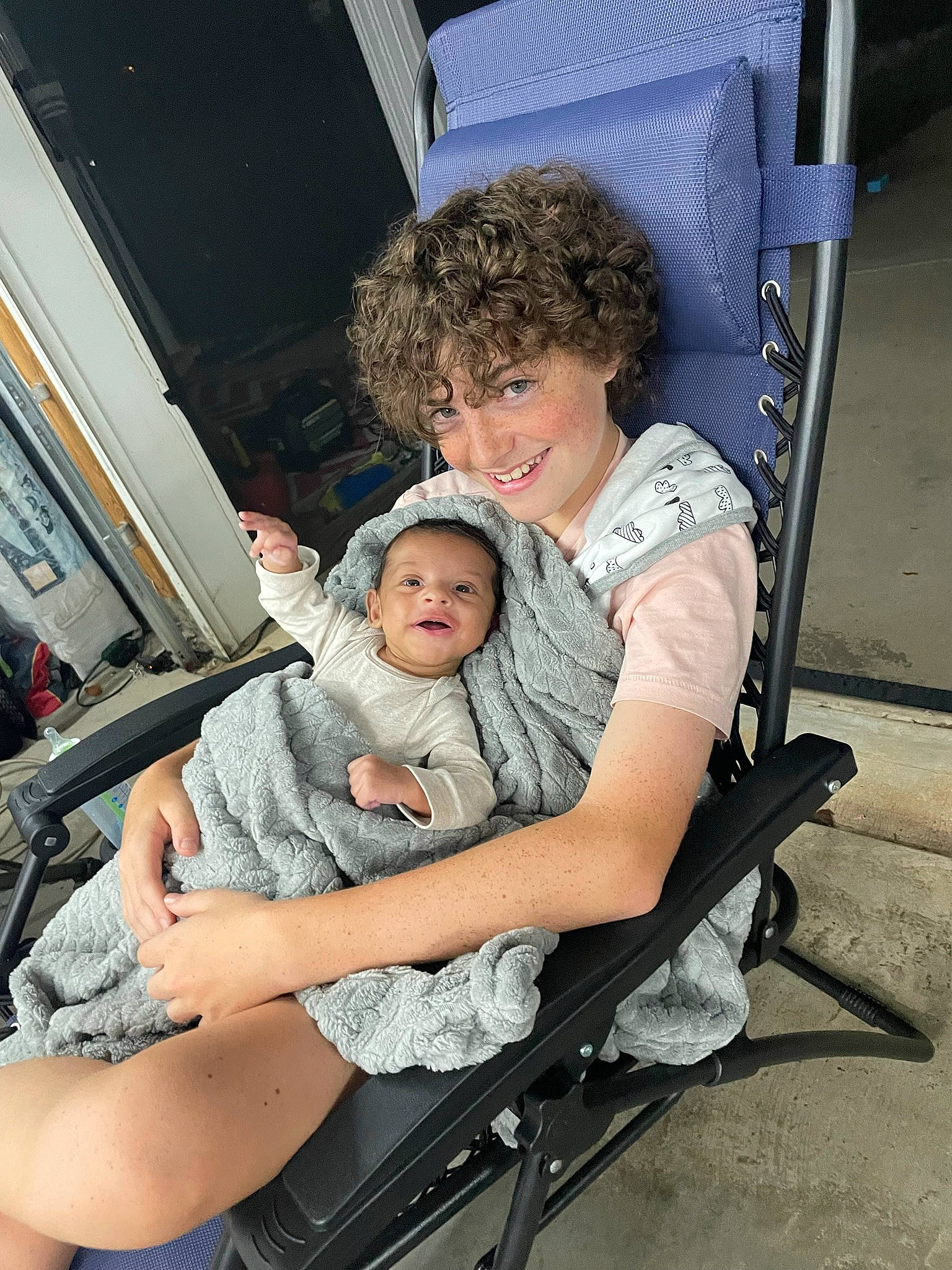 Apollo is registered to the contest to win money with this photo: baby, baby_carriage, baby_products, chair, child, comfort, family_car, fun, human_leg, joy, lap, leisure, motor_vehicle, person, shorts, sitting, smile, soldier, t_shirt, thigh