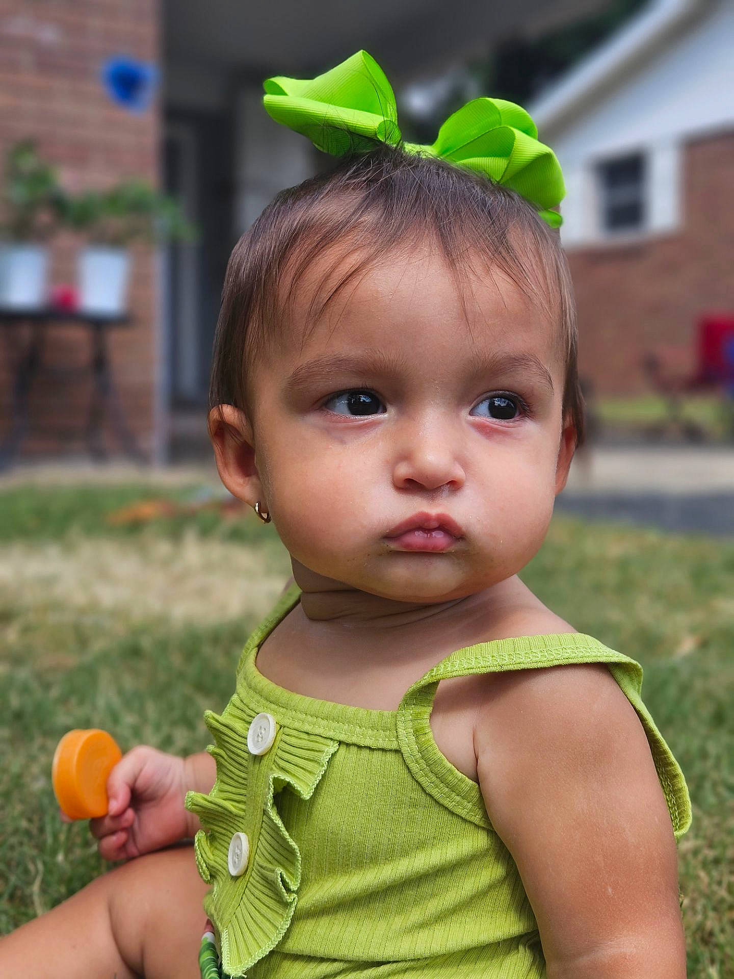Yuna is registered to the contest to win money with this photo: baby_toddler_clothing, child, eye, face, facial_expression, fun, grass, green, hairstyle, happy, iris, leaf, lip, people_in_nature, person, pink, skin, sleeve, summer, toddler