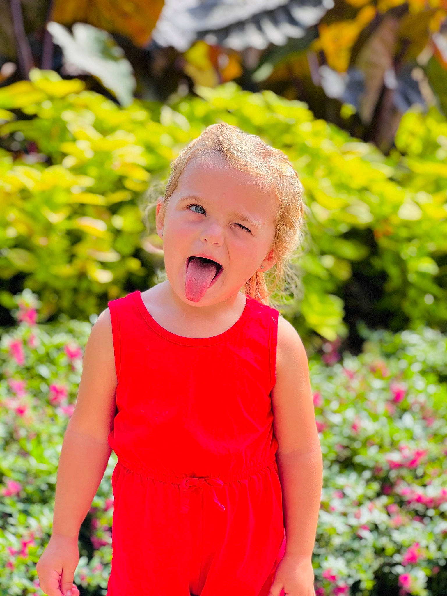 Everly is registered to the contest to win money with this photo: baby, baby_toddler_clothing, day_dress, dress, eye, fun, gesture, grass, hair, happy, head, leisure, magenta, people_in_nature, person, pink, plant, sleeve, smile, toddler