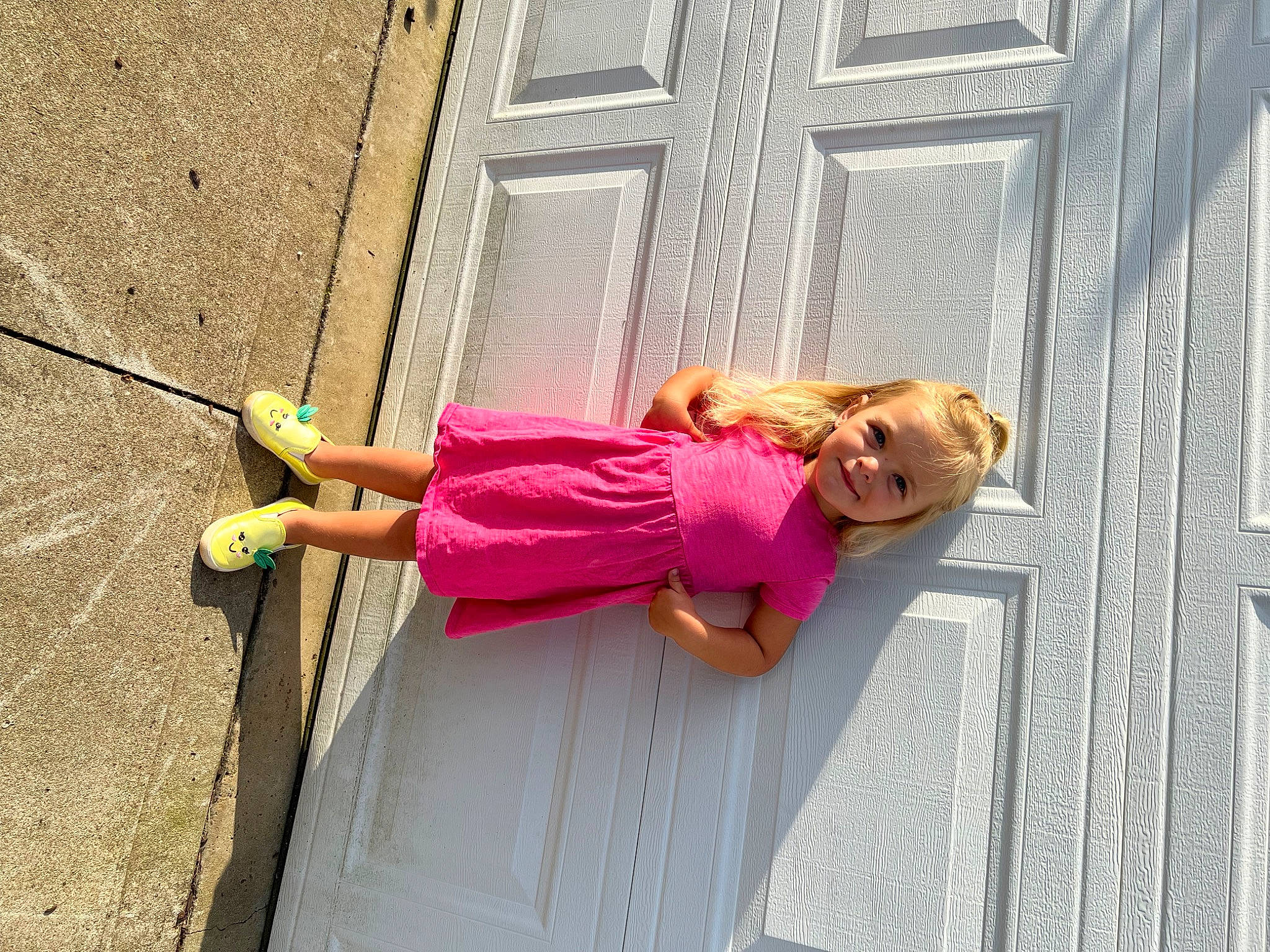 Everly joined the competition — help win amazing prizes! door, dress, fun, human_leg, joy, leg, leisure, magenta, mammal, person, pink, recreation, shoe, sidewalk, smile, sneakers, thigh, toddler, tree, vertebrate