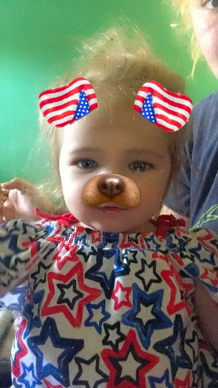 Kylee joined the competition — help win amazing prizes! cheek, child, fictional_character, flag_of_the_united_states, head, person, toddler, toy