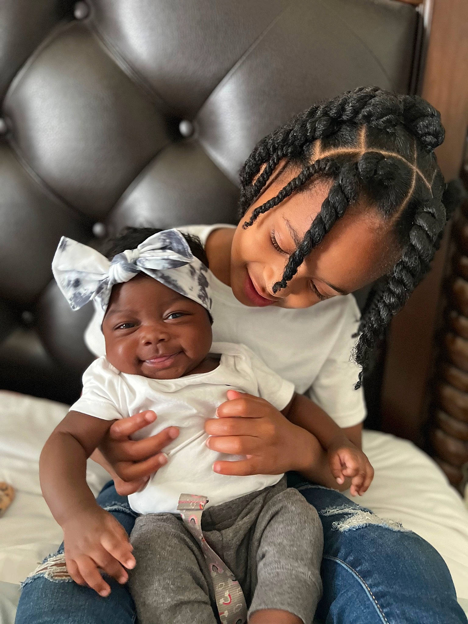 Noelani is registered to the contest to win money with this photo: baby, child, comfort, elbow, event, eyewear, flash_photography, fun, gesture, glasses, happy, hat, headwear, jeans, person, service, sitting, skin, sunglasses, t_shirt