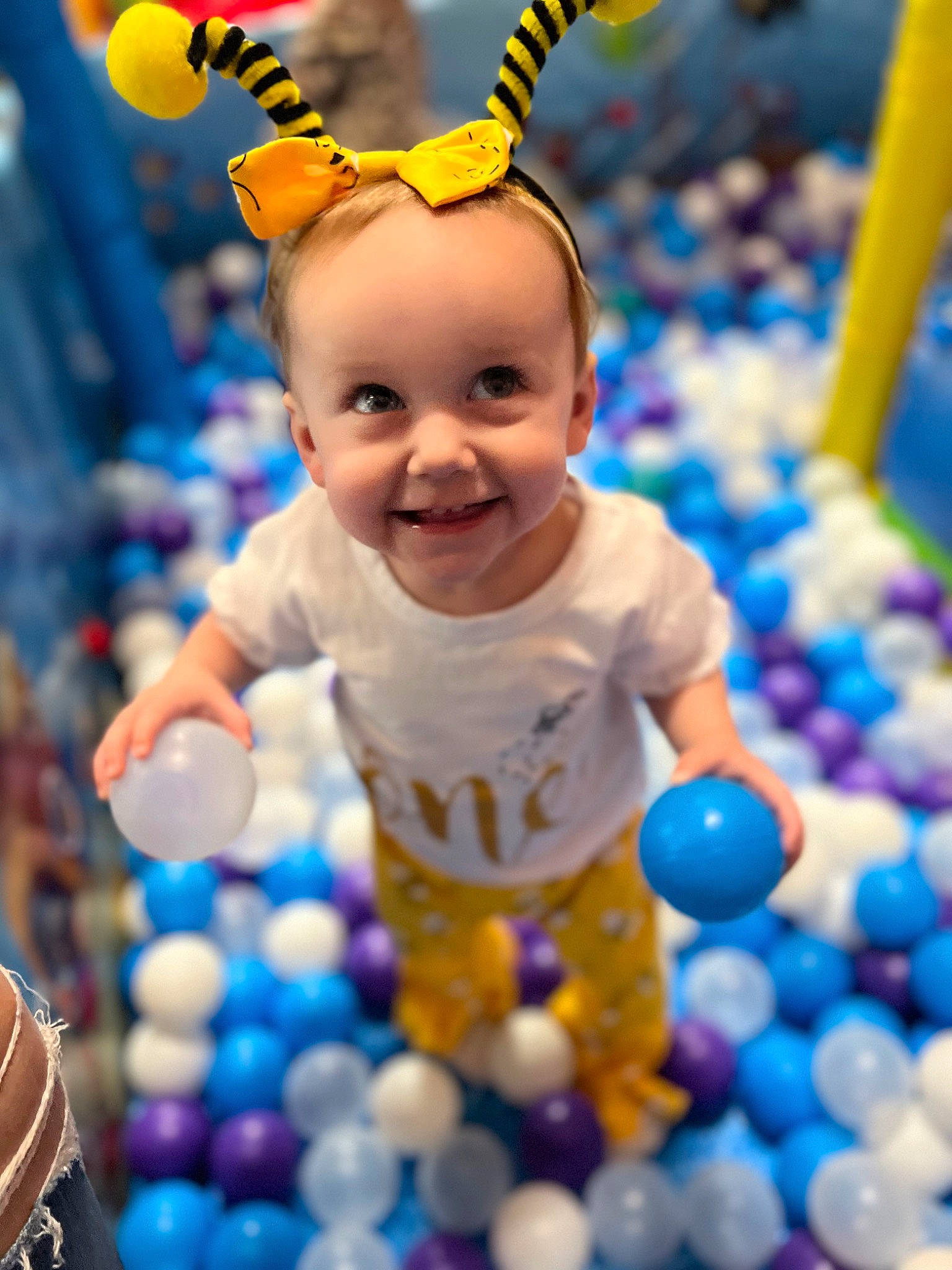 Presley is registered to the contest to win money with this photo: baby, baby_toddler_clothing, ball_pit, blue, child, event, fun, happy, joy, leisure, light, party_supply, people, person, photograph, play, product, smile, snapshot, toddler