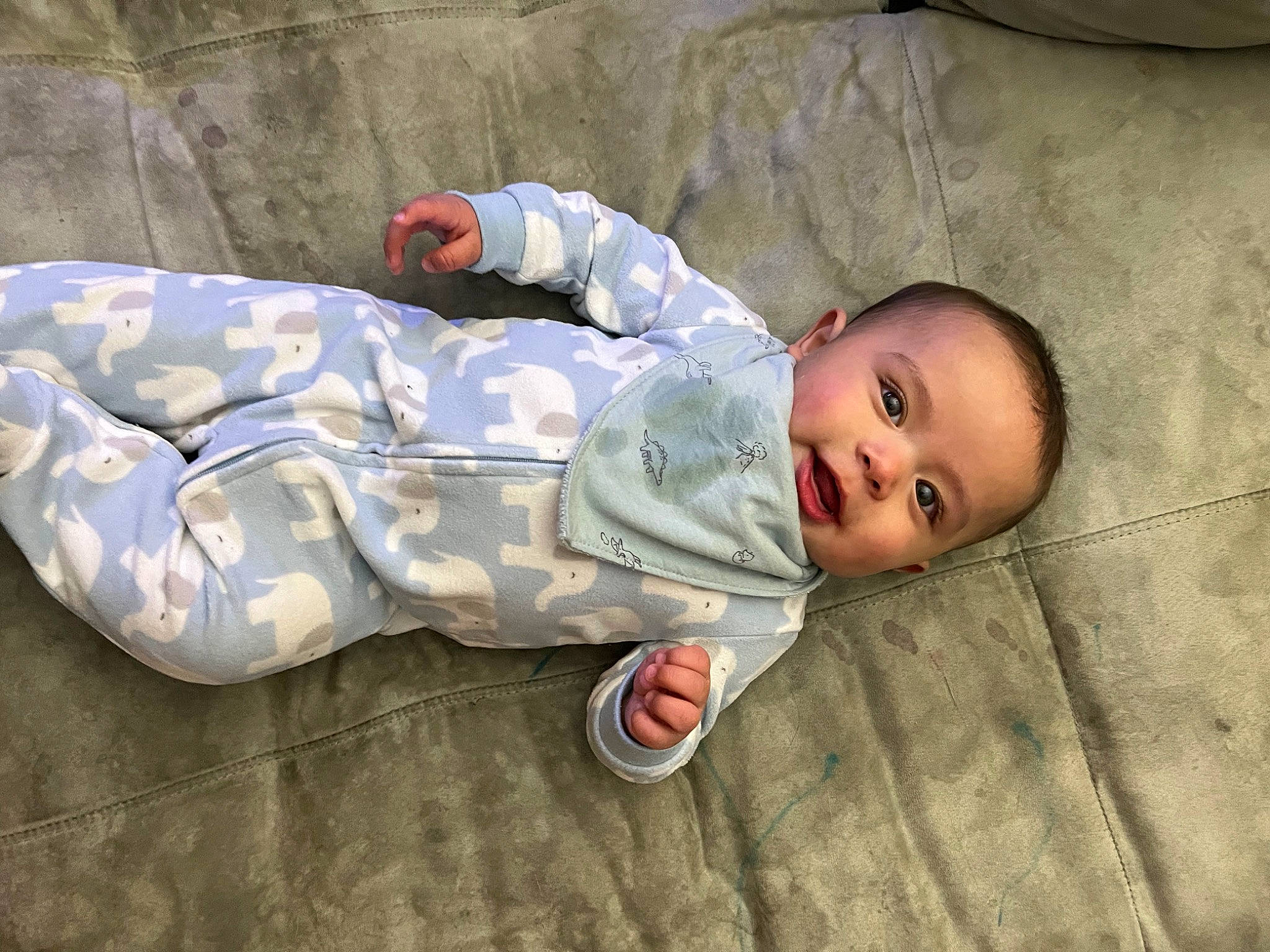 David is registered to the contest to win money with this photo: baby, baby_products, baby_toddler_clothing, carmine, child, comfort, flooring, foot, grass, head, linens, mammal, nap, pattern, person, sitting, skin, sleep, sleeve, toddler