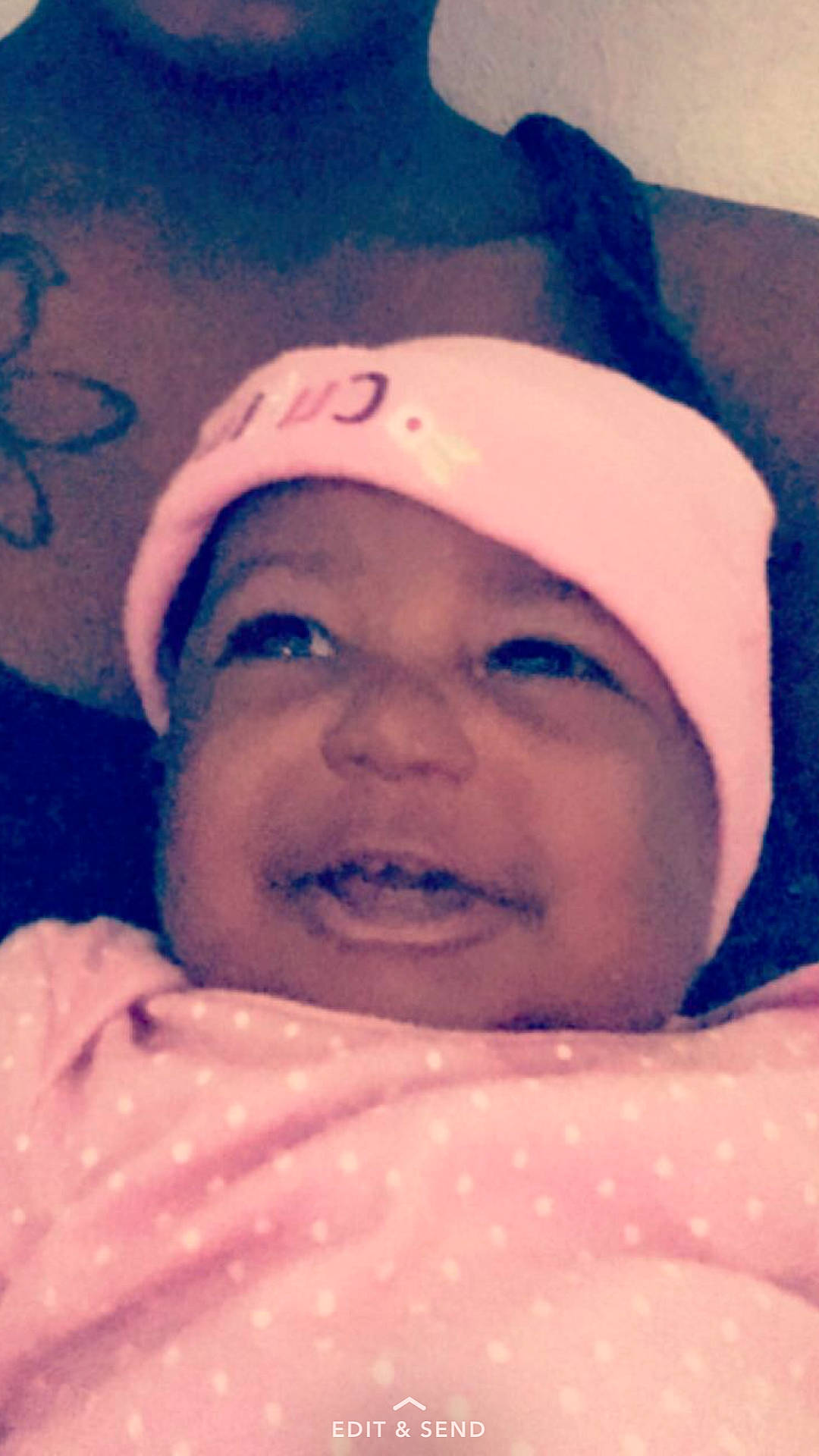 Aulani is registered to the contest to win money with this photo: cheek, child, chin, close_up, cool, eye, eyebrow, face, forehead, head, headwear, human, infant, lip, mouth, nose, person, pink, purple, skin