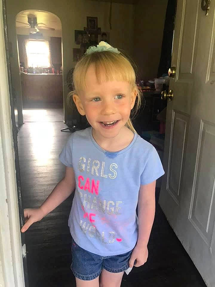 Annalee is registered to the contest to win money with this photo: arm, cheek, child, chin, cool, ear, fun, hair, head, joy, leg, person, shoulder, sleeve, smile, standing, t_shirt, toddler, top, vacation