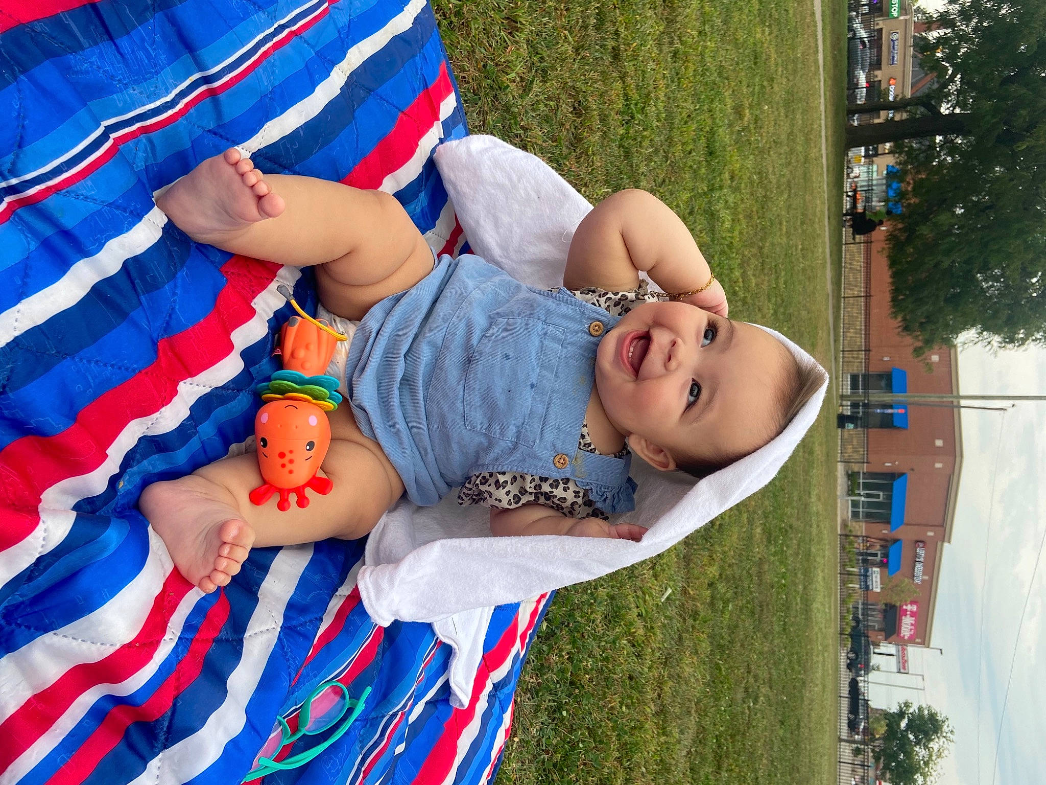 Natalia is registered to the contest to win money with this photo: azure, baby_toddler_clothing, blue, child, electric_blue, event, fun, grass, happy, hat, jeans, joy, leisure, person, plant, recreation, red, smile, summer, t_shirt