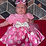 baby, sleeping, pink_dress, polka_dot, bow, headband, shoes, minnie_mouse, pacifier, blanket, patterned, infant, cute, child, clothing, footwear, lying_down, indoors, soft, resting
