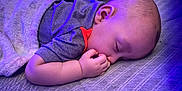 Diantae is registered to the contest to win money with this photo: baby, bed, bedroom, blanket, bodypart, couch, face, finger, furniture, hand, head, indoors, newborn, person, photography, portrait, purple, quilt, sleeping, towel