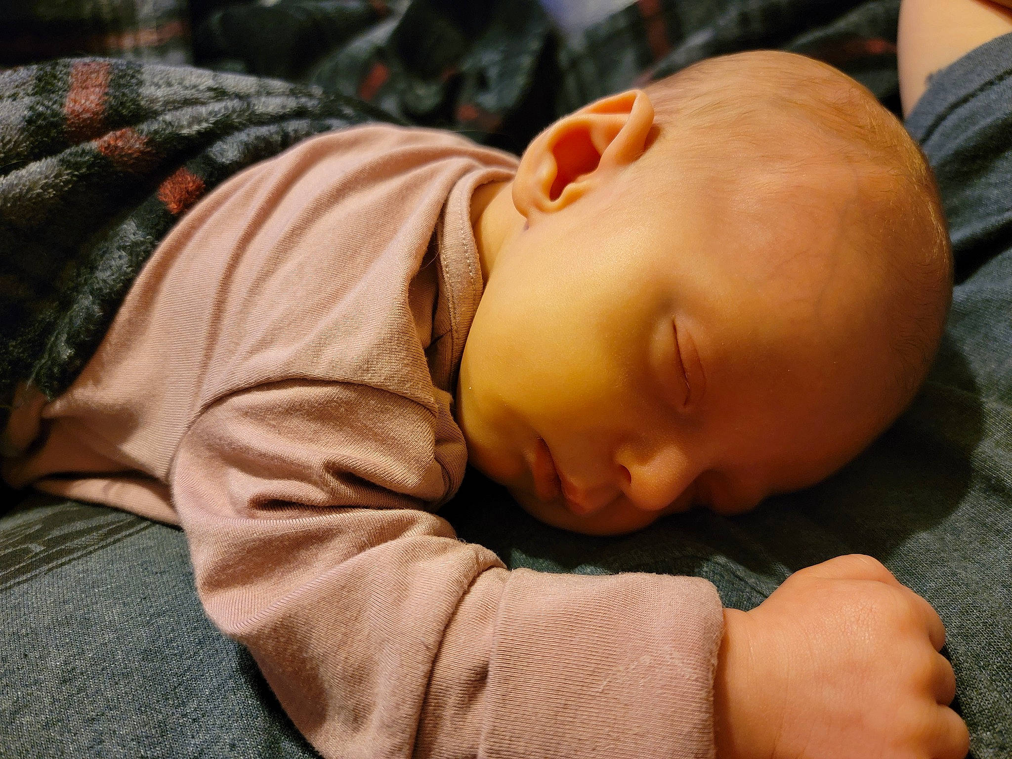 Dakota is registered to the contest to win money with this photo: baby, baby_toddler_clothing, bedtime, cheek, child, comfort, flooring, grass, linens, nap, nose, person, portrait_photography, room, sitting, skin, sleep, toddler, wood