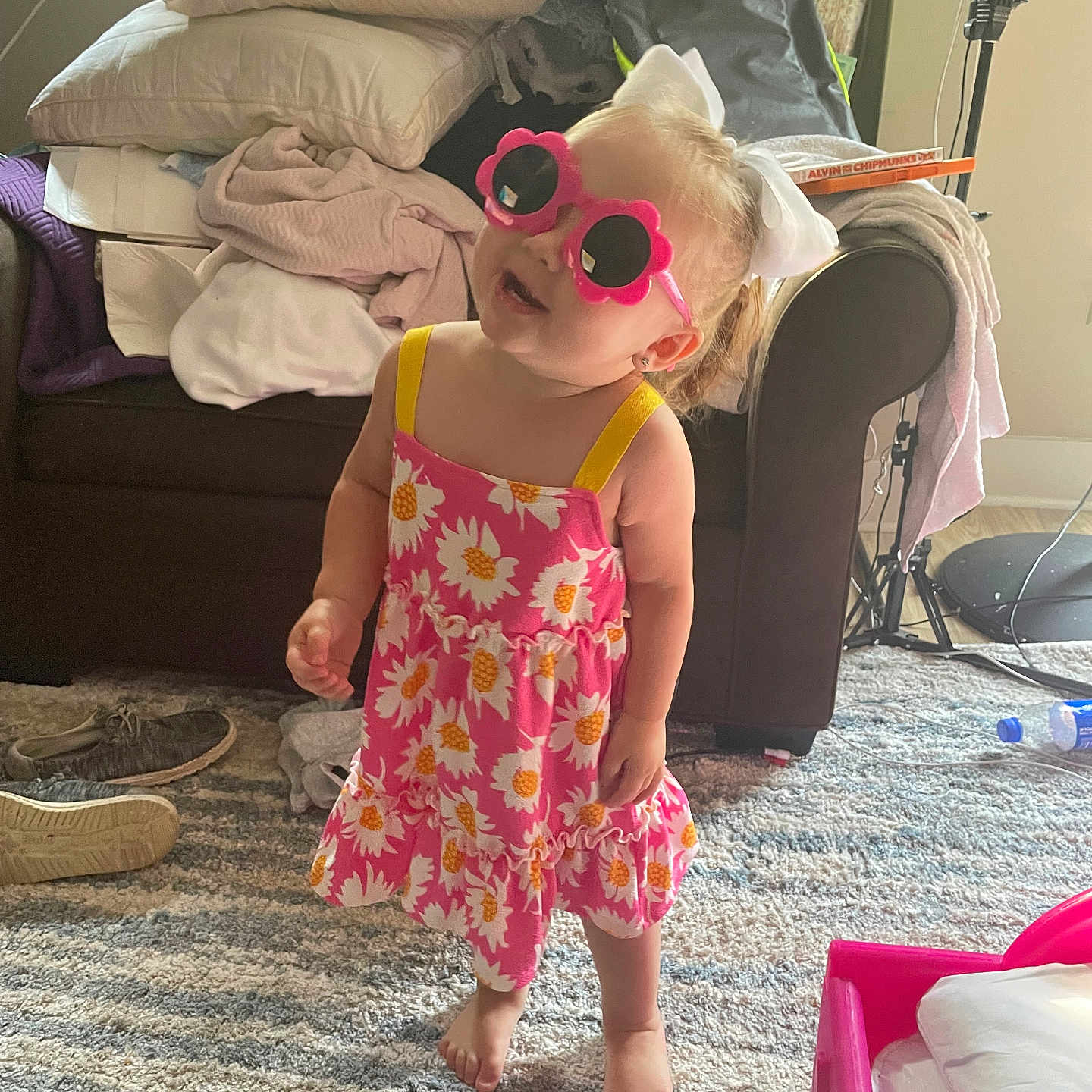 Angel is registered to the contest to win money with this photo: accessories, architecture, baby, building, clothing, couch, cushion, dress, face, footwear, furniture, head, homedecor, indoors, livingroom, person, photography, portrait, room, sunglasses