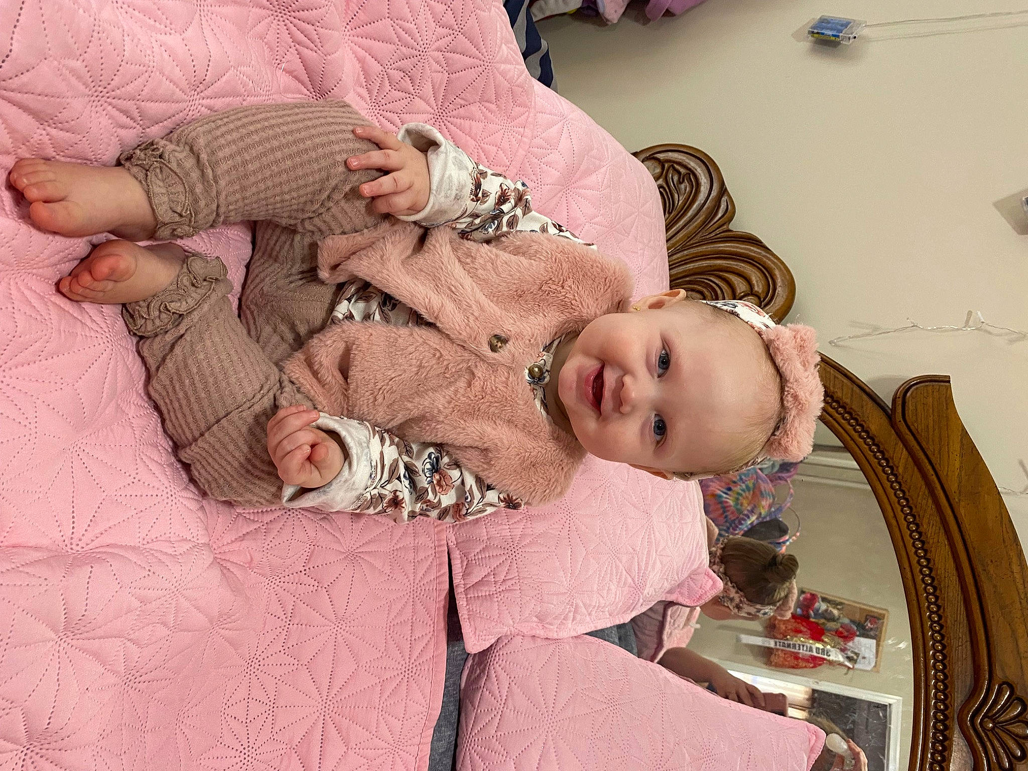 Angel is registered to the contest to win money with this photo: baby, baby_products, baby_sleeping, baby_toddler_clothing, chair, cheek, child, comfort, flooring, happy, joy, linens, pattern, person, pink, room, sitting, skin, sleeve, smile