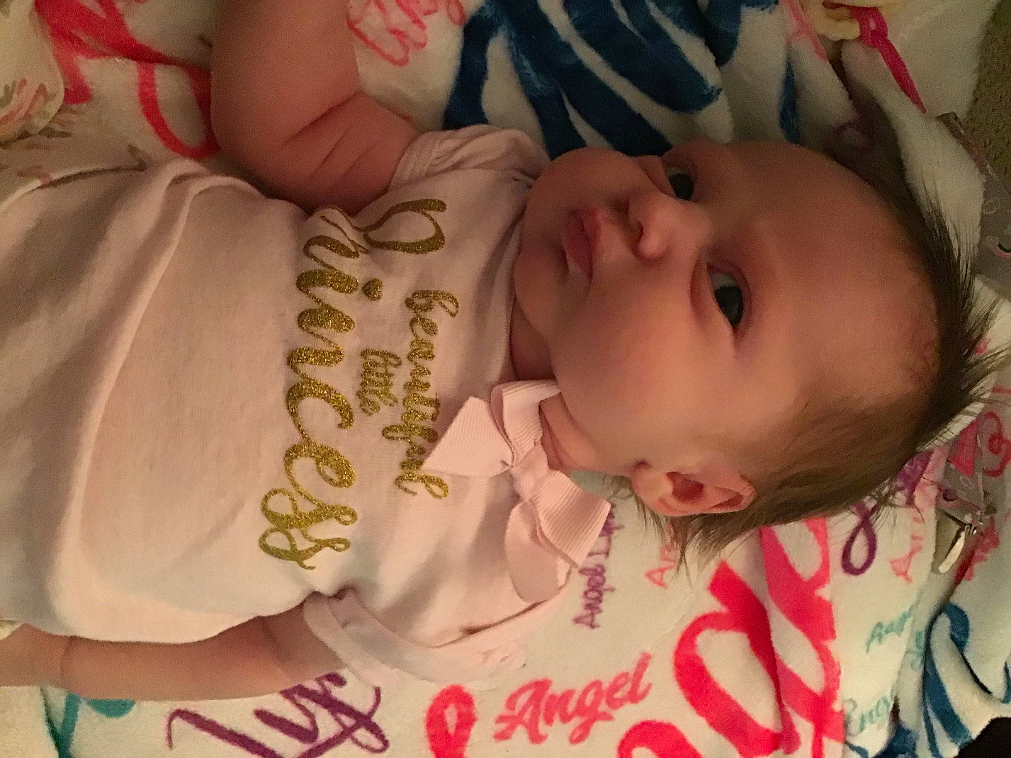 Angel is registered to the contest to win money with this photo: baby, baby_toddler_clothing, cheek, child, chin, eye, eyebrow, eyelash, face, happy, head, human_body, lip, mouth, neck, nose, person, pink, skin, sleeve