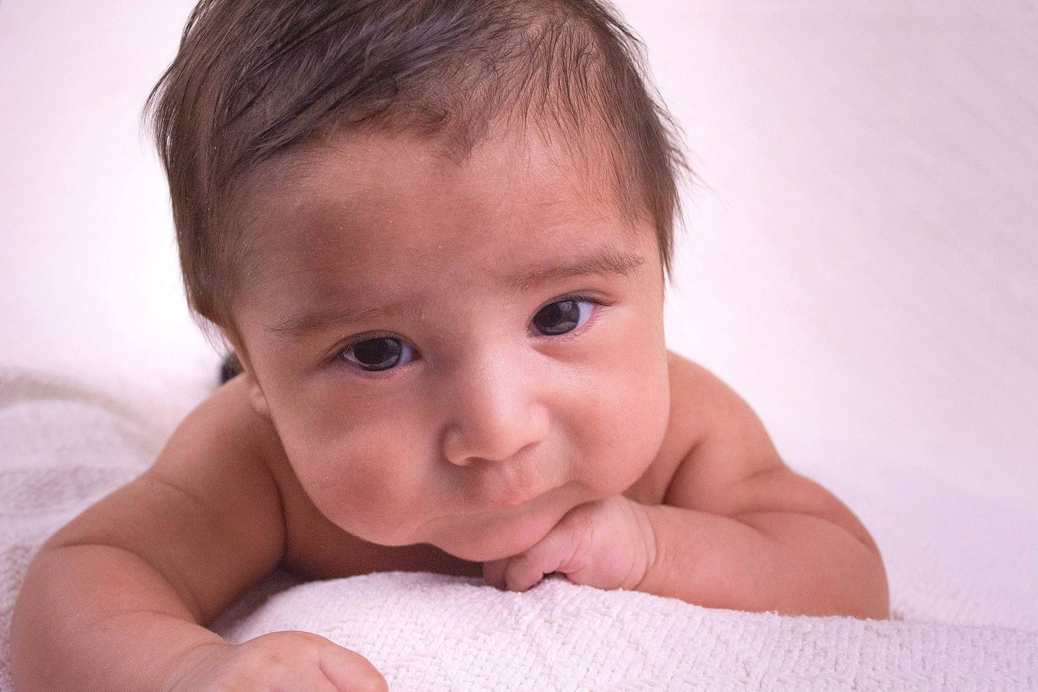 Jacob is registered to the contest to win money with this photo: baby, cheek, comfort, ear, eyelash, finger, flash_photography, gesture, hair, hand, happy, head, human_body, iris, lip, nose, person, skin, smile, thumb