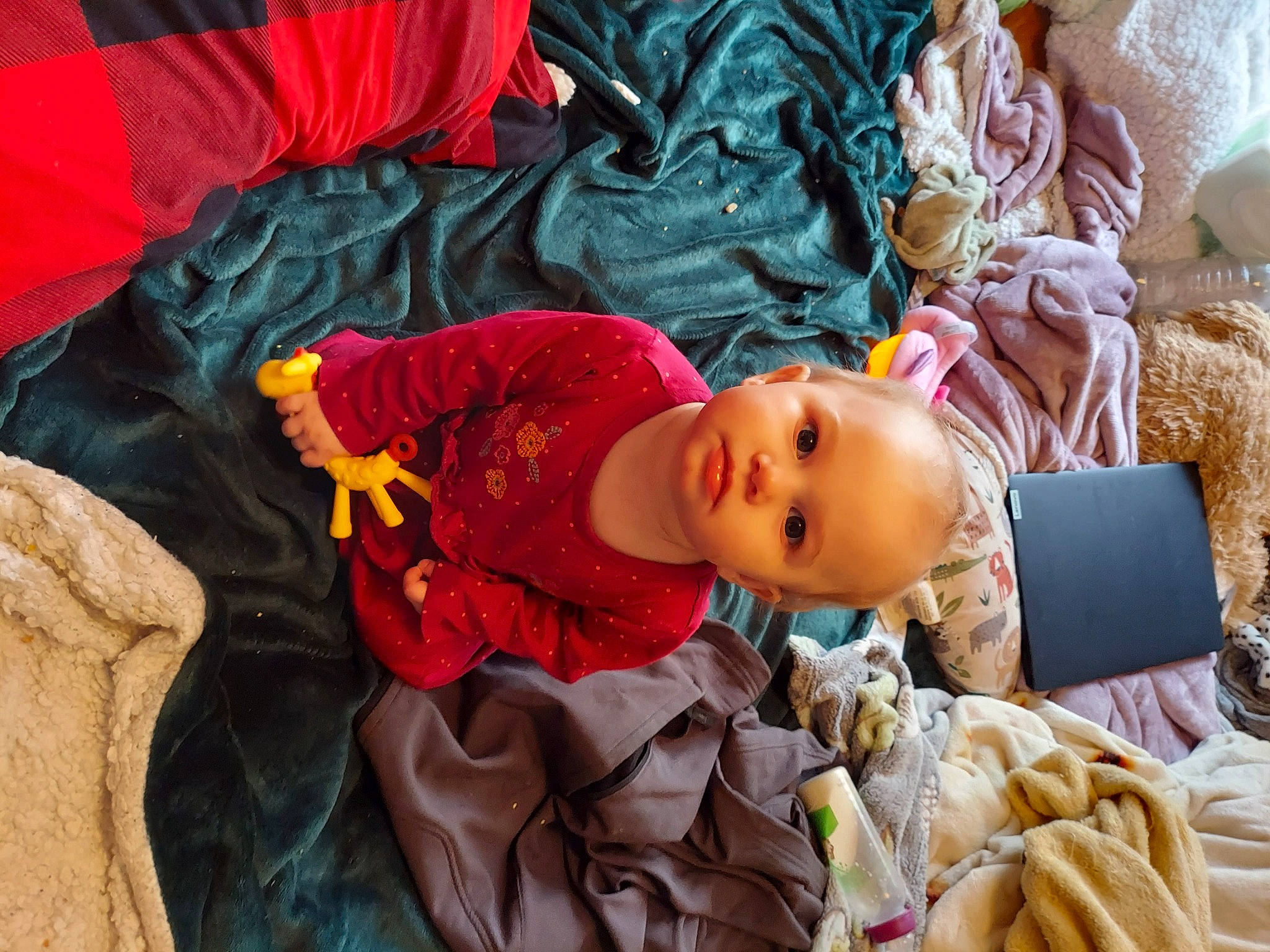 Andromeda is registered to the contest to win money with this photo: baby, baby_products, baby_toddler_clothing, child, comfort, doll, event, happy, hat, human, human_body, nap, orange, person, room, sitting, textile, toddler, toy, tradition