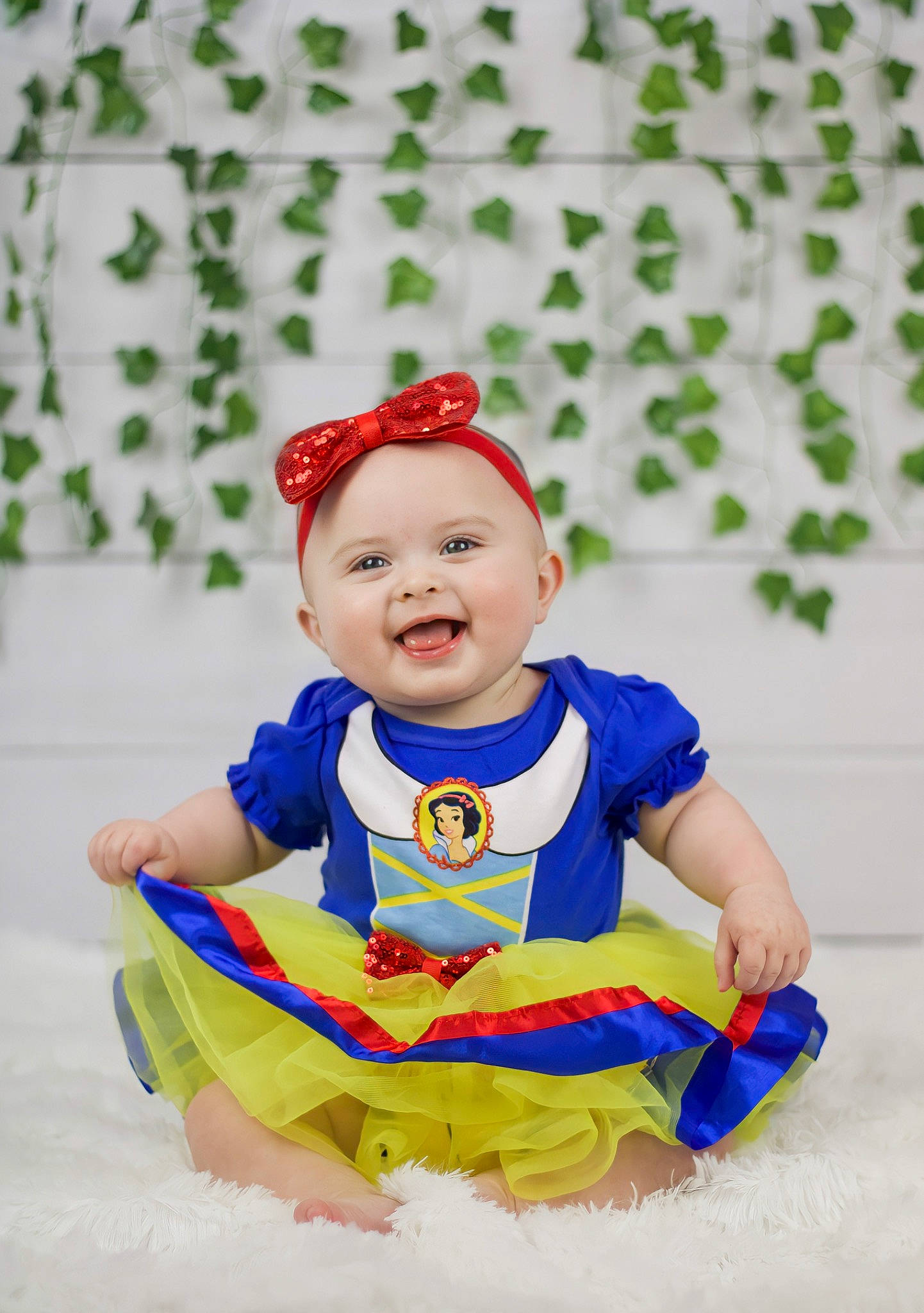 Addilyn is registered to the contest to win money with this photo: baby, baby_playing_with_toys, baby_products, baby_toddler_clothing, cap, child, costume, costume_hat, electric_blue, event, fictional_character, fun, happy, hat, headgear, headwear, joy, party_supply, person, sleeve