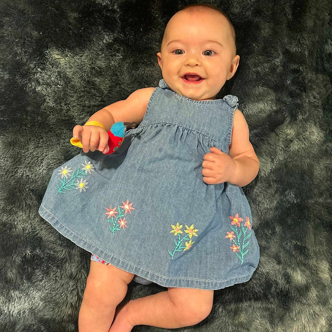 Tattianna joined the competition — help win amazing prizes! baby, bodypart, clothing, dress, face, happy, head, jeans, laughing, mouth, newborn, pants, pattern, person, photography, portrait, sitting, skirt, smile, teeth