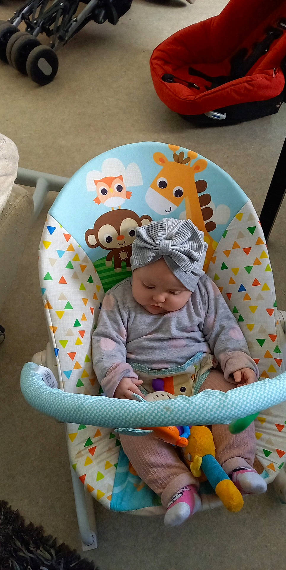 Lhaya a rejoint le concours — aidez-le/la à gagner de superbes lots ! baby, baby_products, baby_toddler_clothing, beanie, cap, child, comfort, flooring, fun, headgear, headwear, helmet, hoodie, leisure, person, personal_protective_equipment, play, recreation, sitting, sleeve