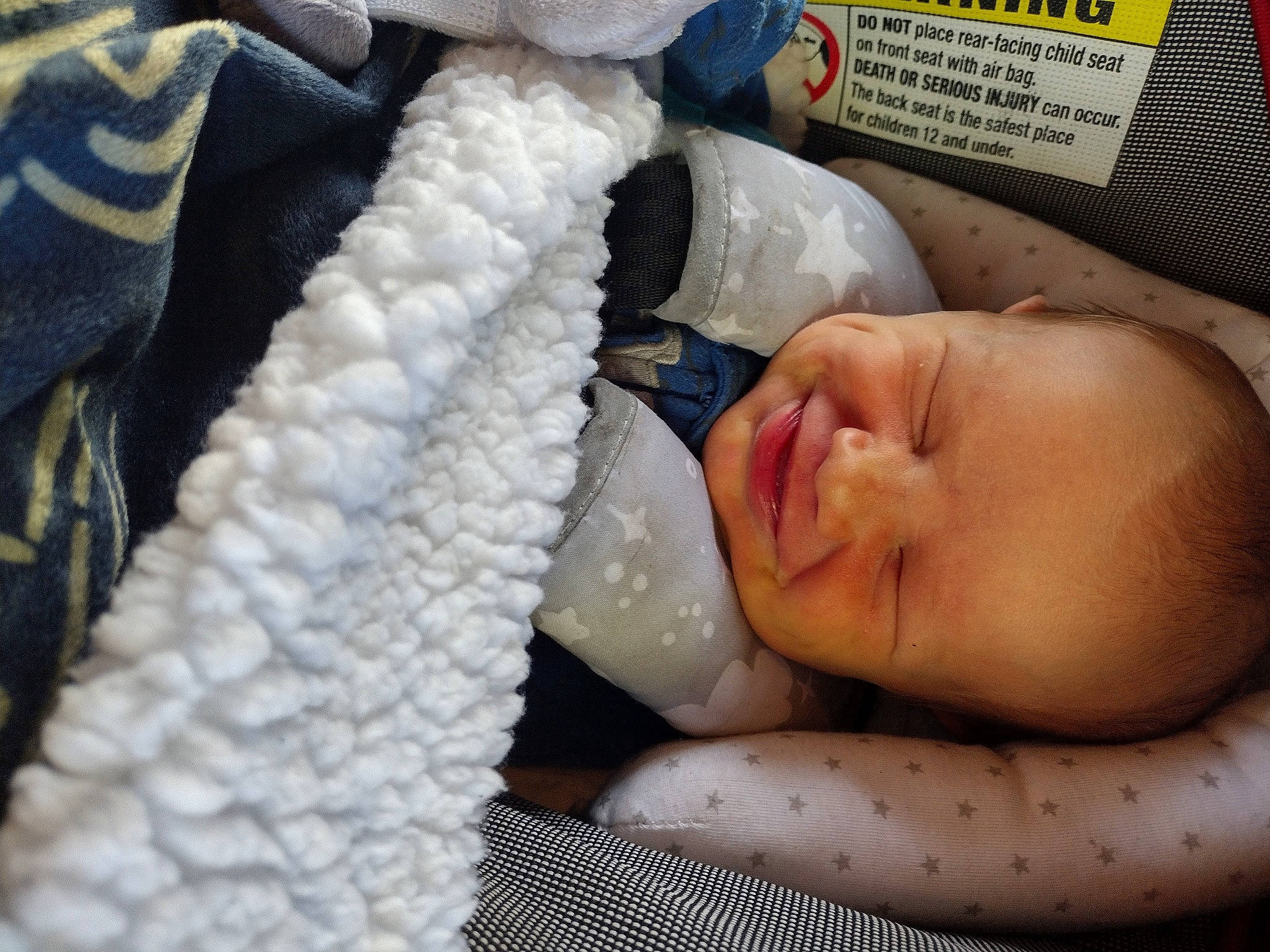 Jackson is registered to the contest to win money with this photo: baby, baby_products, baby_safety, baby_sleeping, baby_toddler_clothing, bedtime, child, childbirth, close_up, comfort, finger, headgear, linens, nose, pattern, person, skin, textile, toddler, white