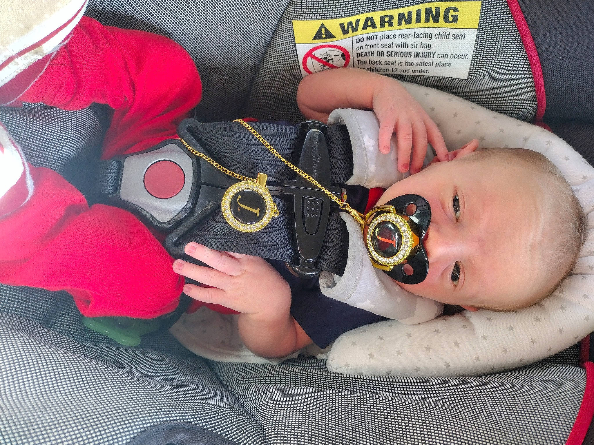 Jackson is registered to the contest to win money with this photo: baby, baby_products, baby_toddler_clothing, cheek, child, comfort, eyelash, eyewear, finger, gesture, hand, headgear, human_body, mouth, nail, person, personal_protective_equipment, skin, thumb, toddler