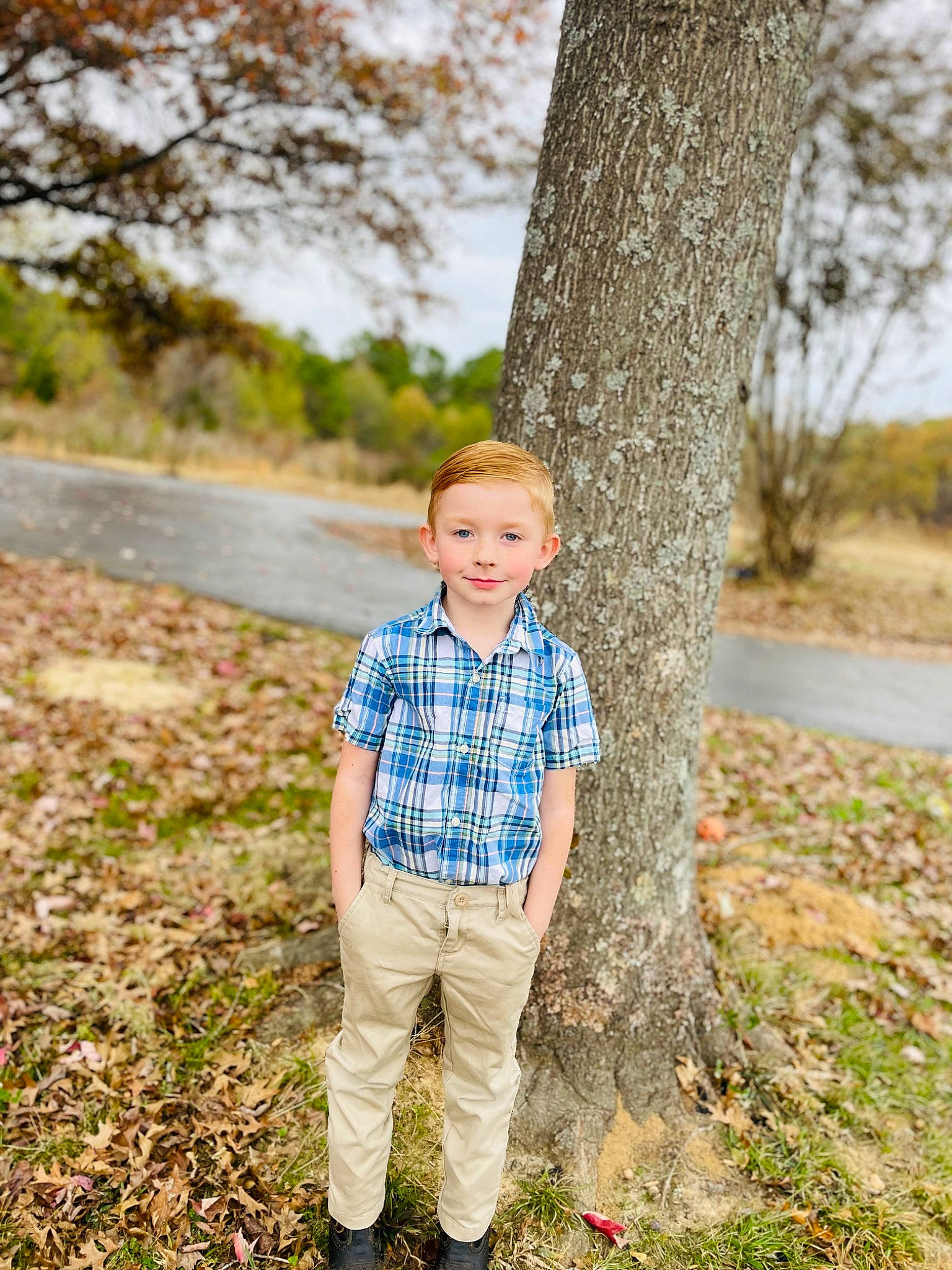 Cameran joined the competition — help win amazing prizes! branch, deciduous, electric_blue, eye, forest, formal_wear, grass, happy, joy, landscape, leisure, people_in_nature, person, plaid, plant, sky, toddler, tree, trunk, wood