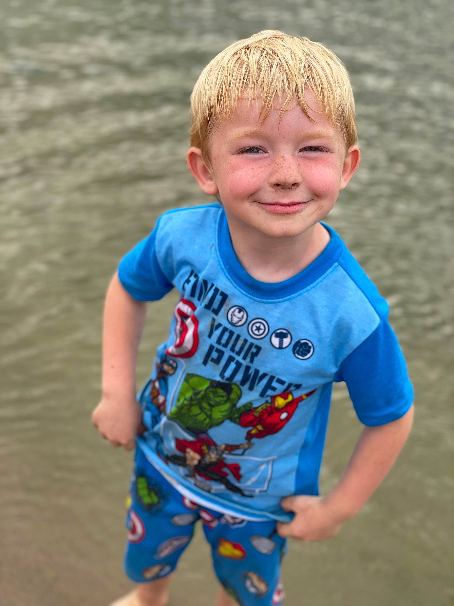 Cameran is registered to the contest to win money with this photo: baby_toddler_clothing, beauty, body_of_water, child, chin, electric_blue, face, facial_expression, fun, happy, head, human_body, joy, leisure, people_in_nature, person, skin, sleeve, smile, t_shirt