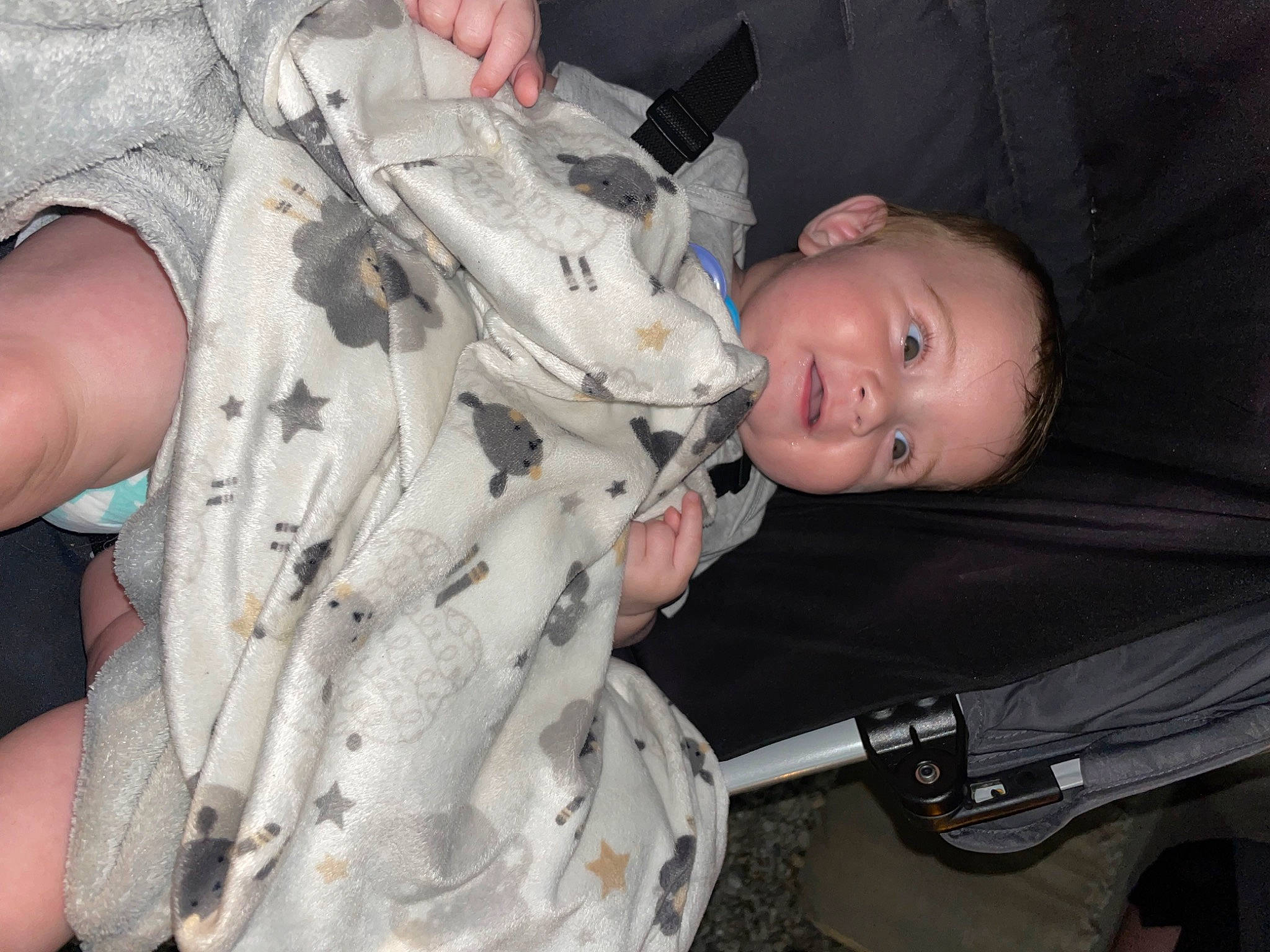 Kevin is registered to the contest to win money with this photo: auto_part, baby, baby_products, chest, child, fun, gesture, human_leg, machine, military_camouflage, nail, pattern, person, personal_protective_equipment, sitting, smile, thumb, toddler