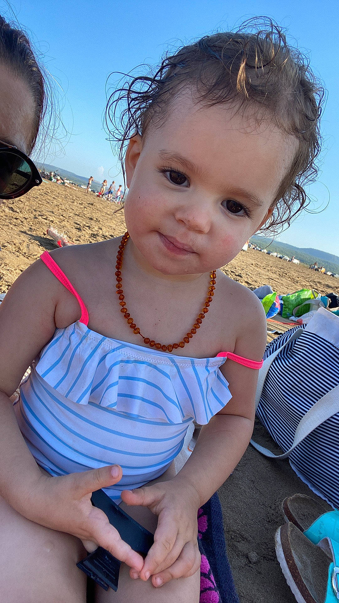 Elyna participe au concours pour gagner de l'argent avec cette photo : azure, baby_toddler_clothing, beach, blue, child, cool, electric_blue, facial_expression, fun, grass, happy, iris, leisure, lip, neck, people_in_nature, person, skin, sky, summer