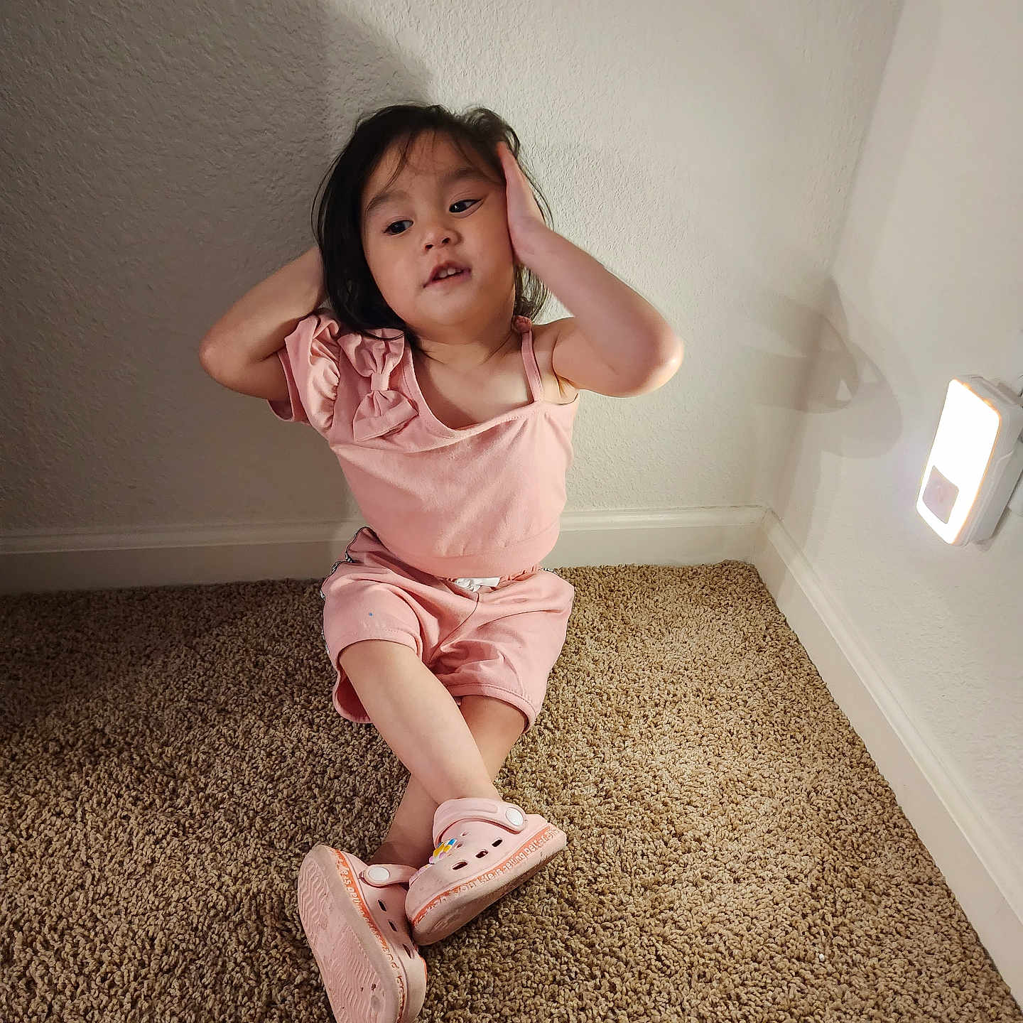 Lin-Z is registered to the contest to win money with this photo: bodypart, child, clothing, face, female, finger, footwear, girl, hand, hardwood, head, person, photography, portrait, sandal, shoe, shorts, sitting, sneaker, wood