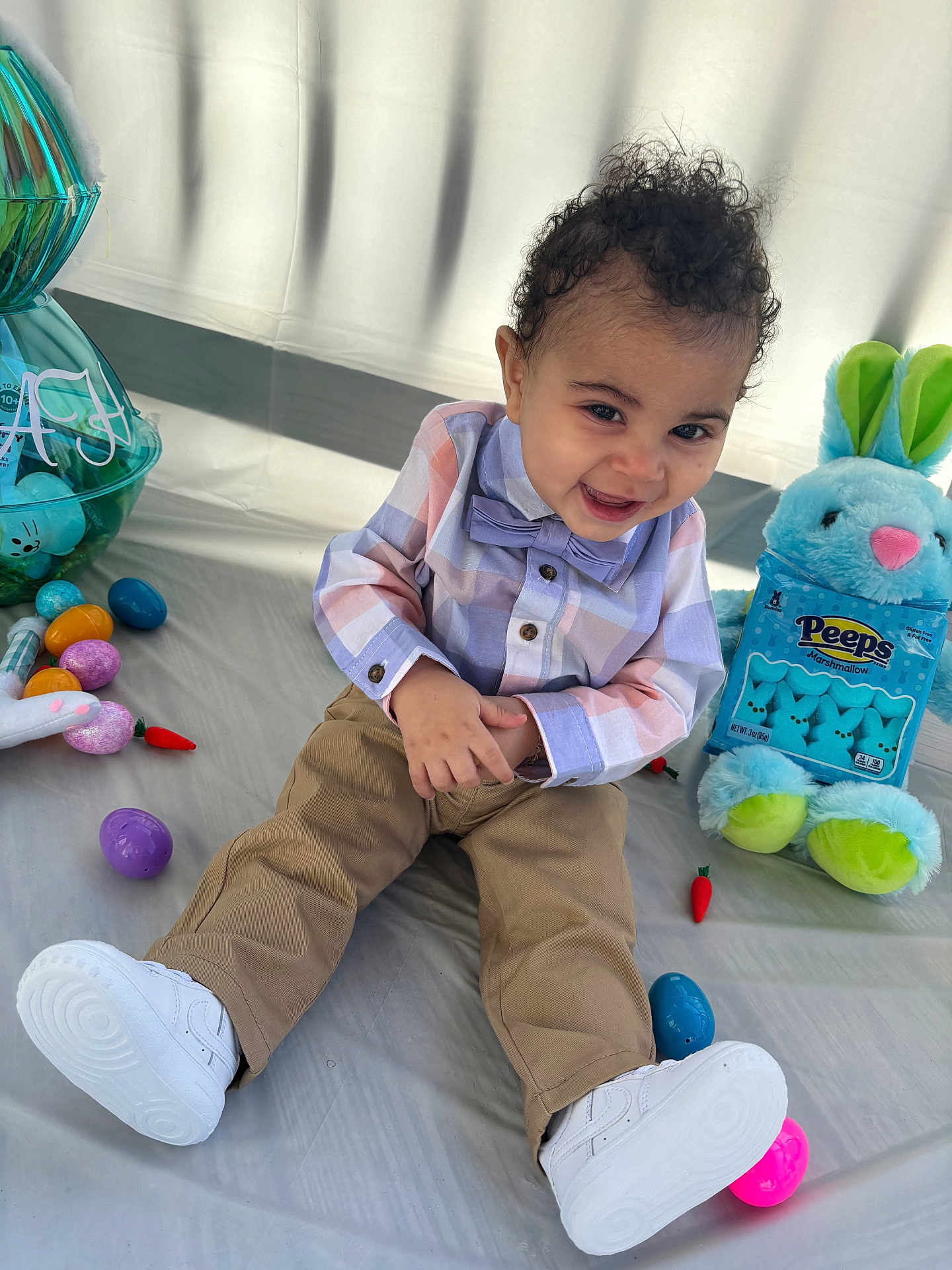 Xevekiah is registered to the contest to win money with this photo: baby, bodypart, clothing, face, finger, footwear, hand, happy, head, medication, pants, person, photography, pill, portrait, shoe, sitting, smile, sphere, toy